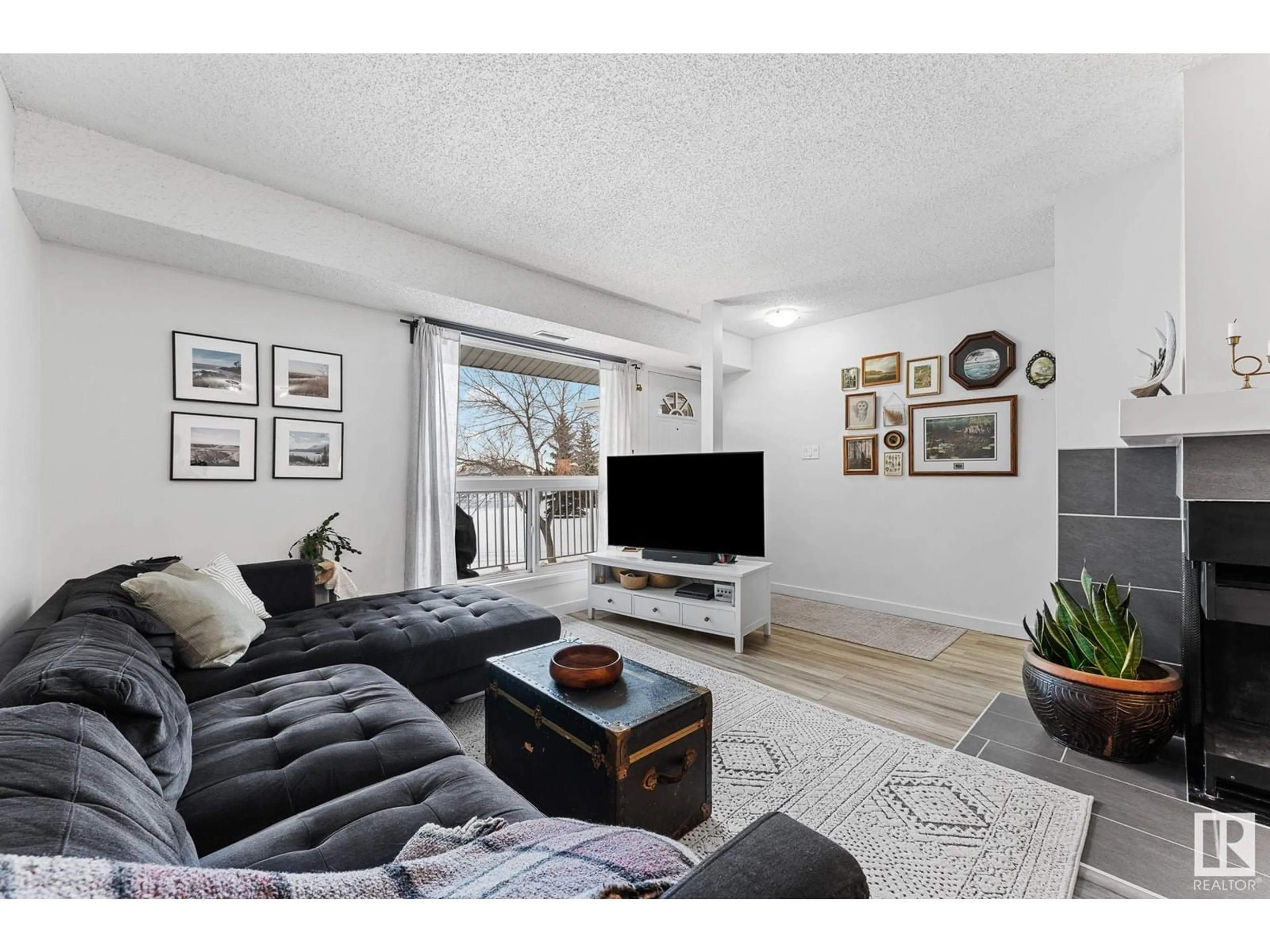 Living room with furniture, unknown for #20 3111 142 AV NW, Edmonton Alberta T5Y2H6