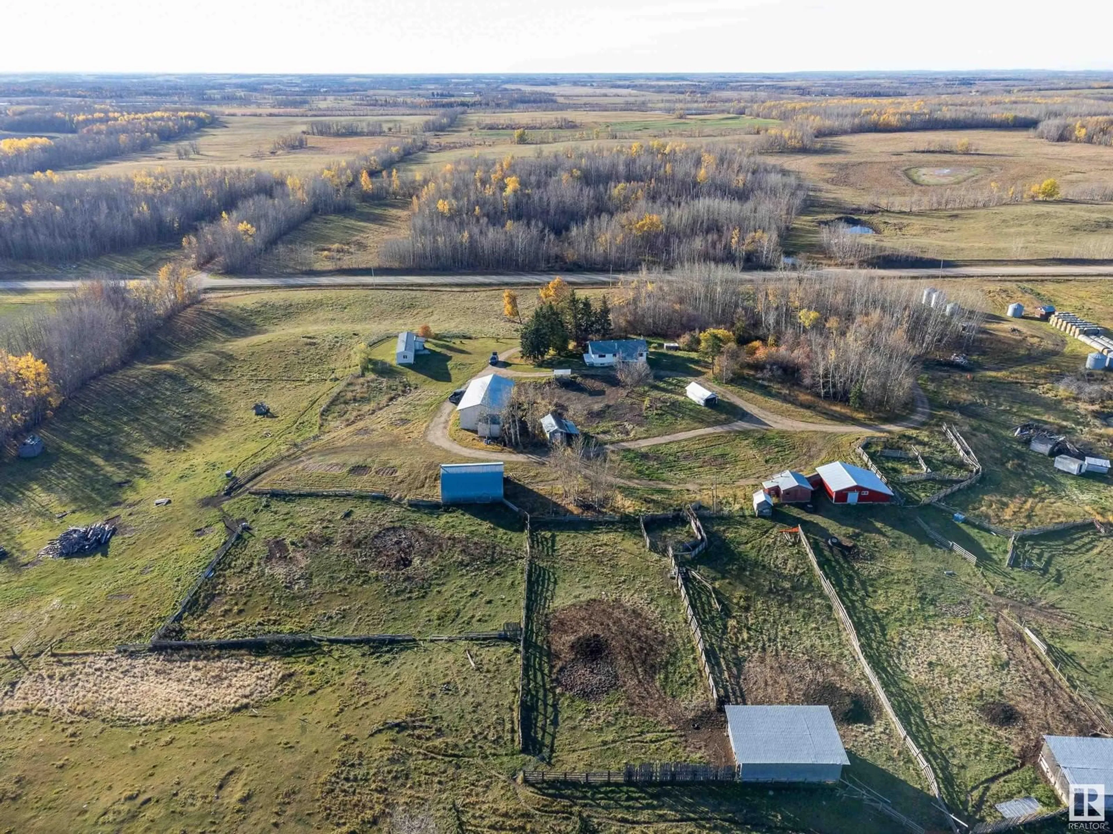 A pic from outside/outdoor area/front of a property/back of a property/a pic from drone, unknown for 5204 Hwy 654, Rural Barrhead County Alberta T7N1H9