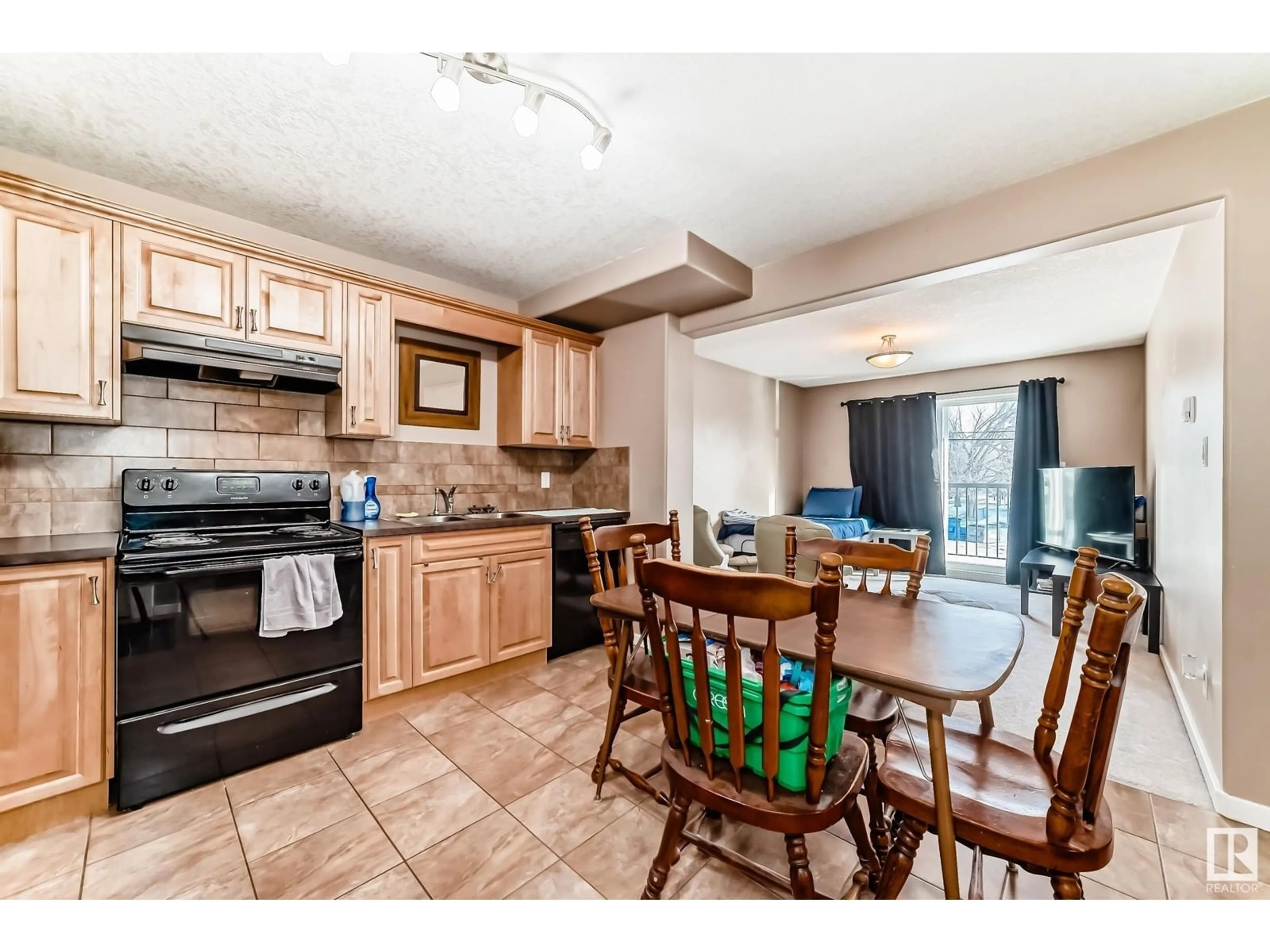 Open concept kitchen, unknown for #101 11935 106 ST NW, Edmonton Alberta T5G2R4