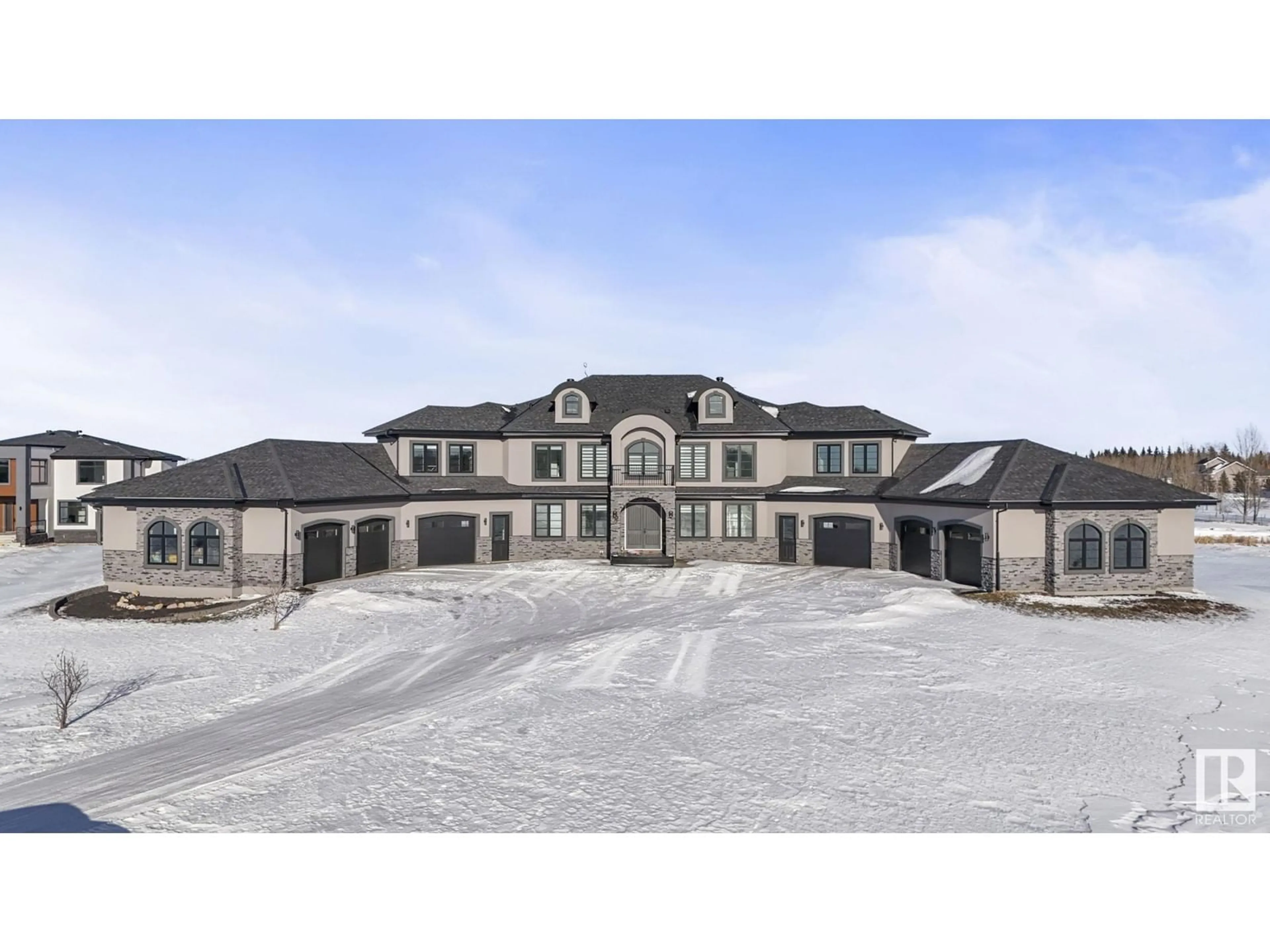 A pic from outside/outdoor area/front of a property/back of a property/a pic from drone, mountain view for #170 23434 505 TWP RD, Rural Leduc County Alberta T4X0S1