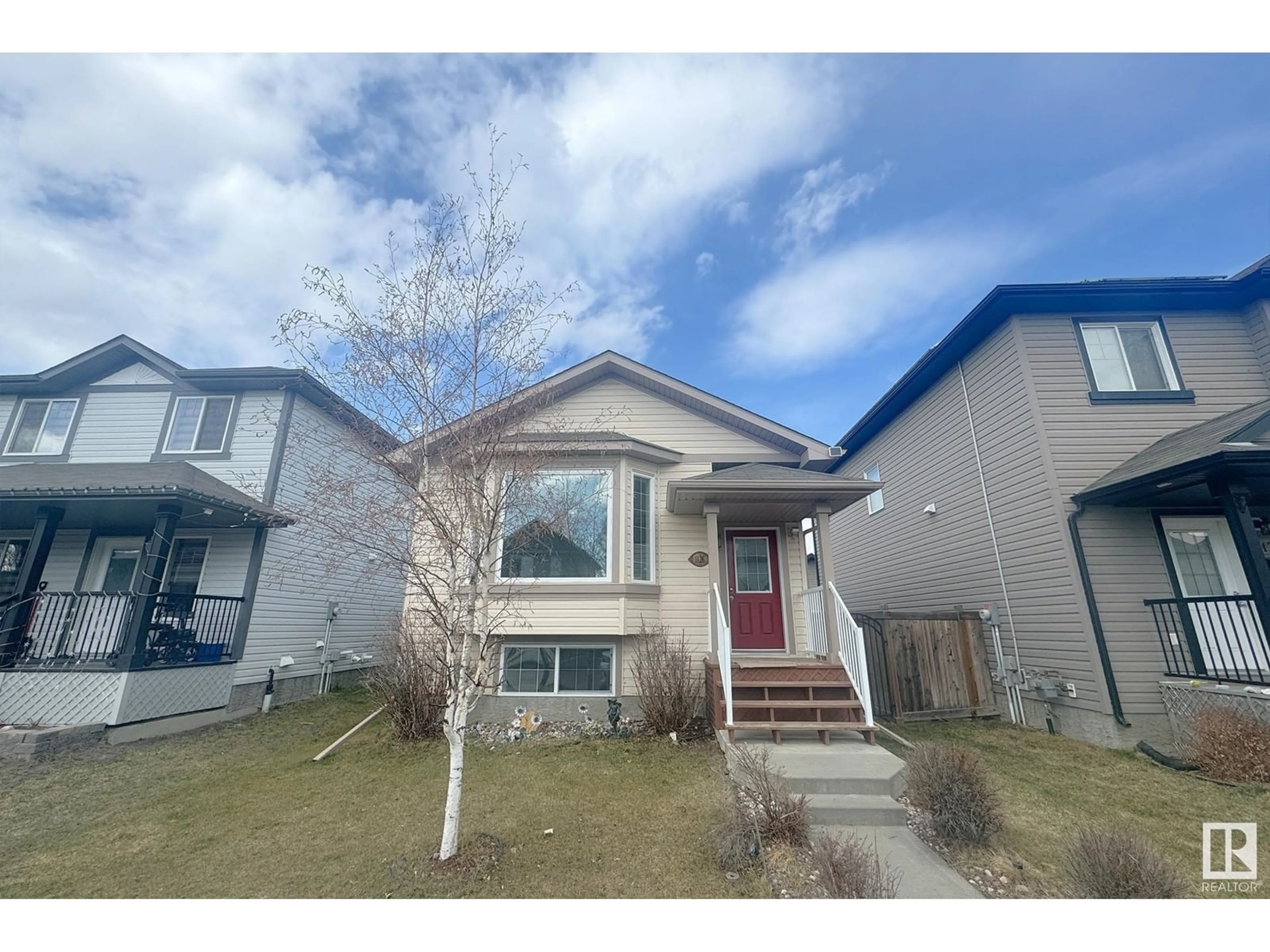 Home with vinyl exterior material, street for 1126 36A AV, Edmonton Alberta T6T0G1