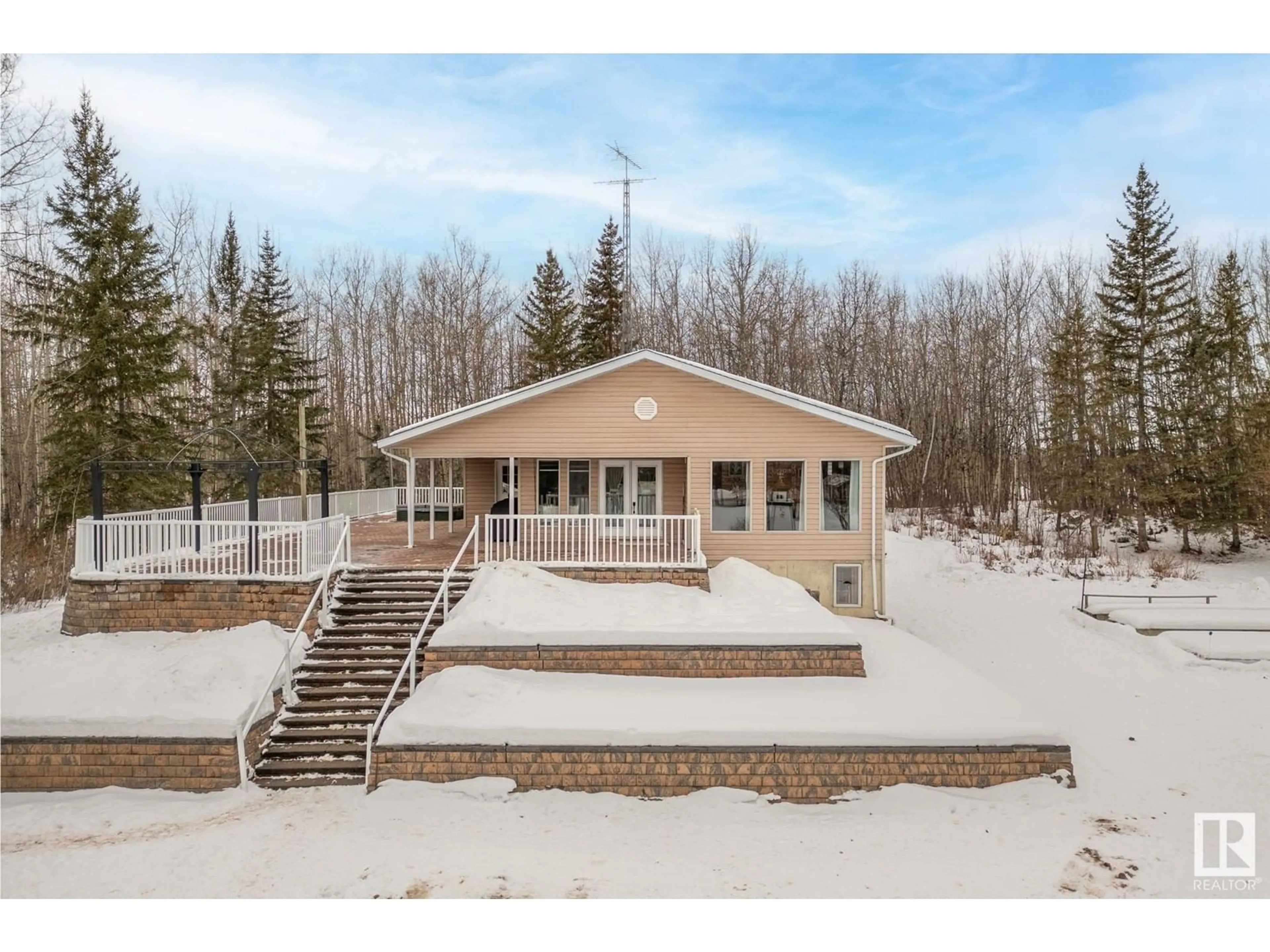 A pic from outside/outdoor area/front of a property/back of a property/a pic from drone, unknown for 4551 22 ST, Rural Wetaskiwin County Alberta T0C2C0