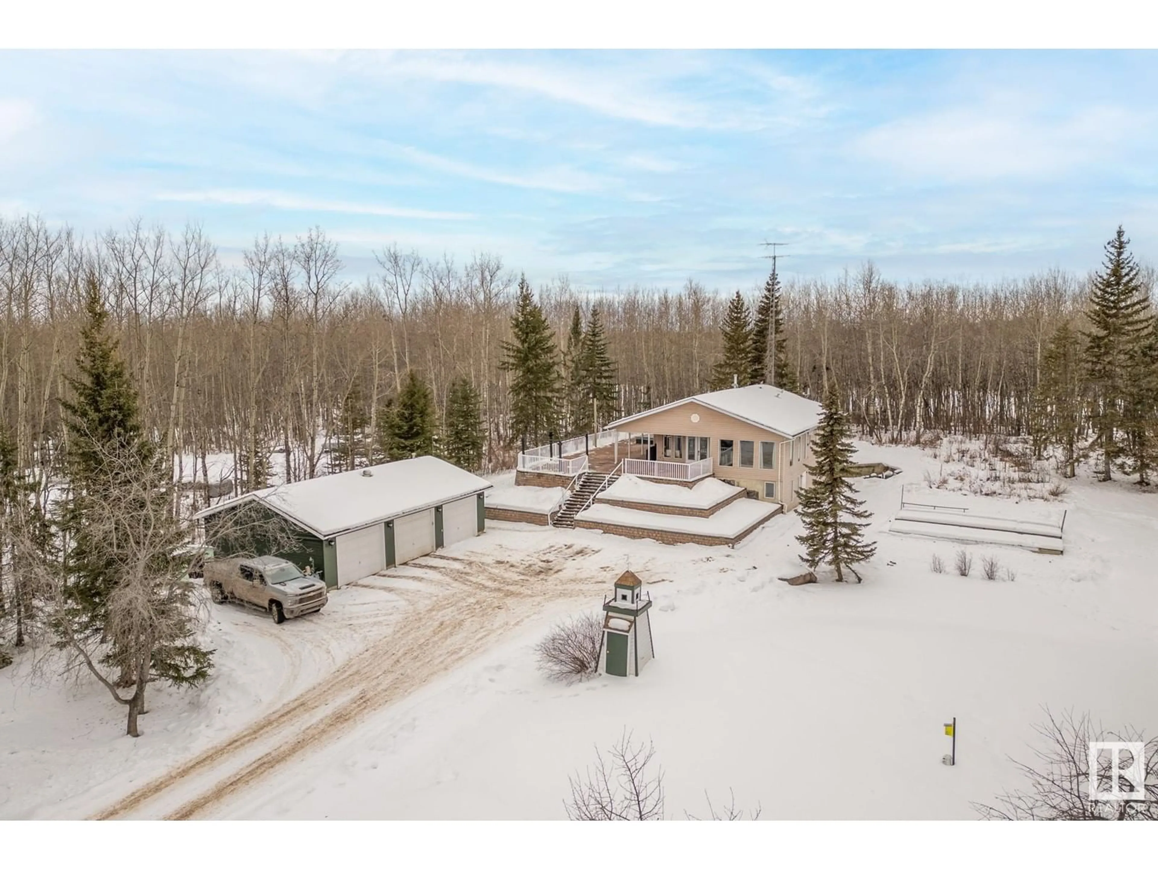 A pic from outside/outdoor area/front of a property/back of a property/a pic from drone, unknown for 4551 22 ST, Rural Wetaskiwin County Alberta T0C2C0