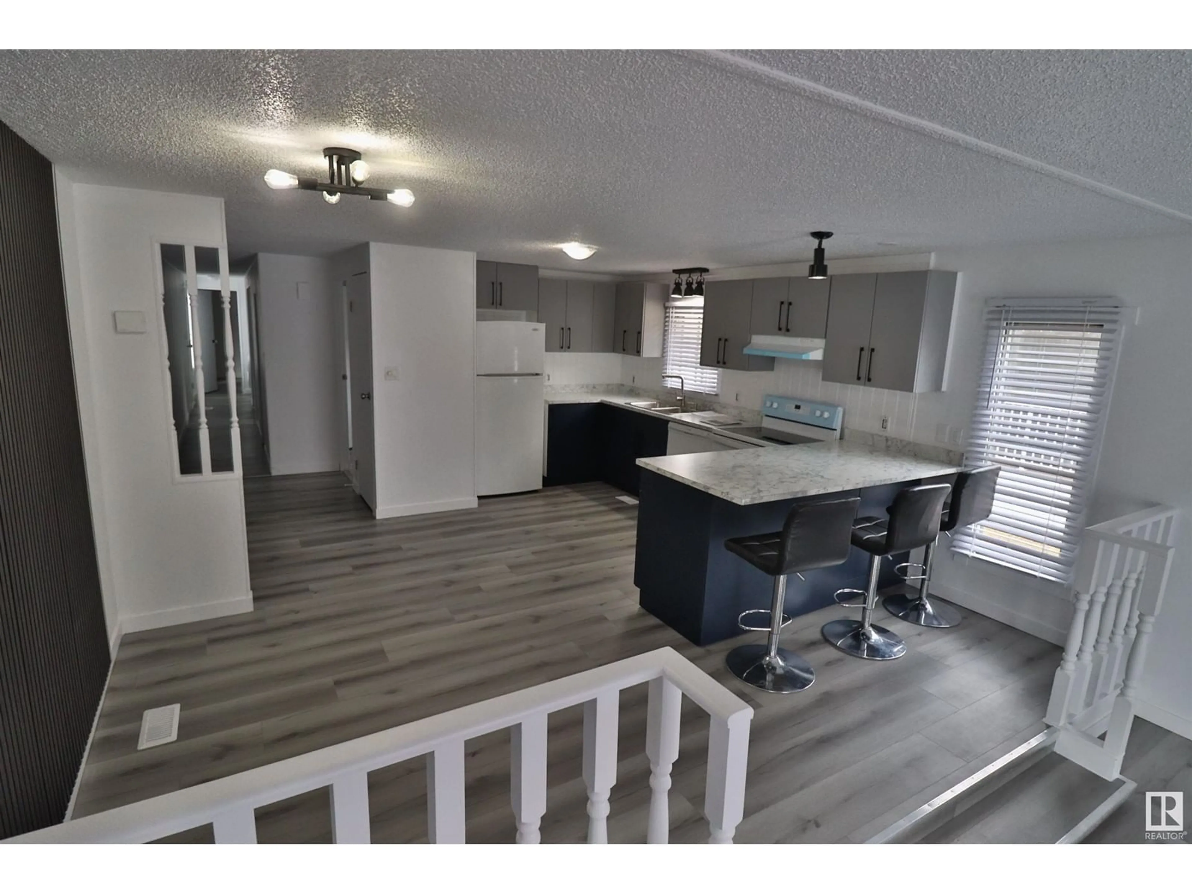 Open concept kitchen, wood/laminate floor for 98 WILLOW PARK ESTATES, Leduc Alberta T9E5R6