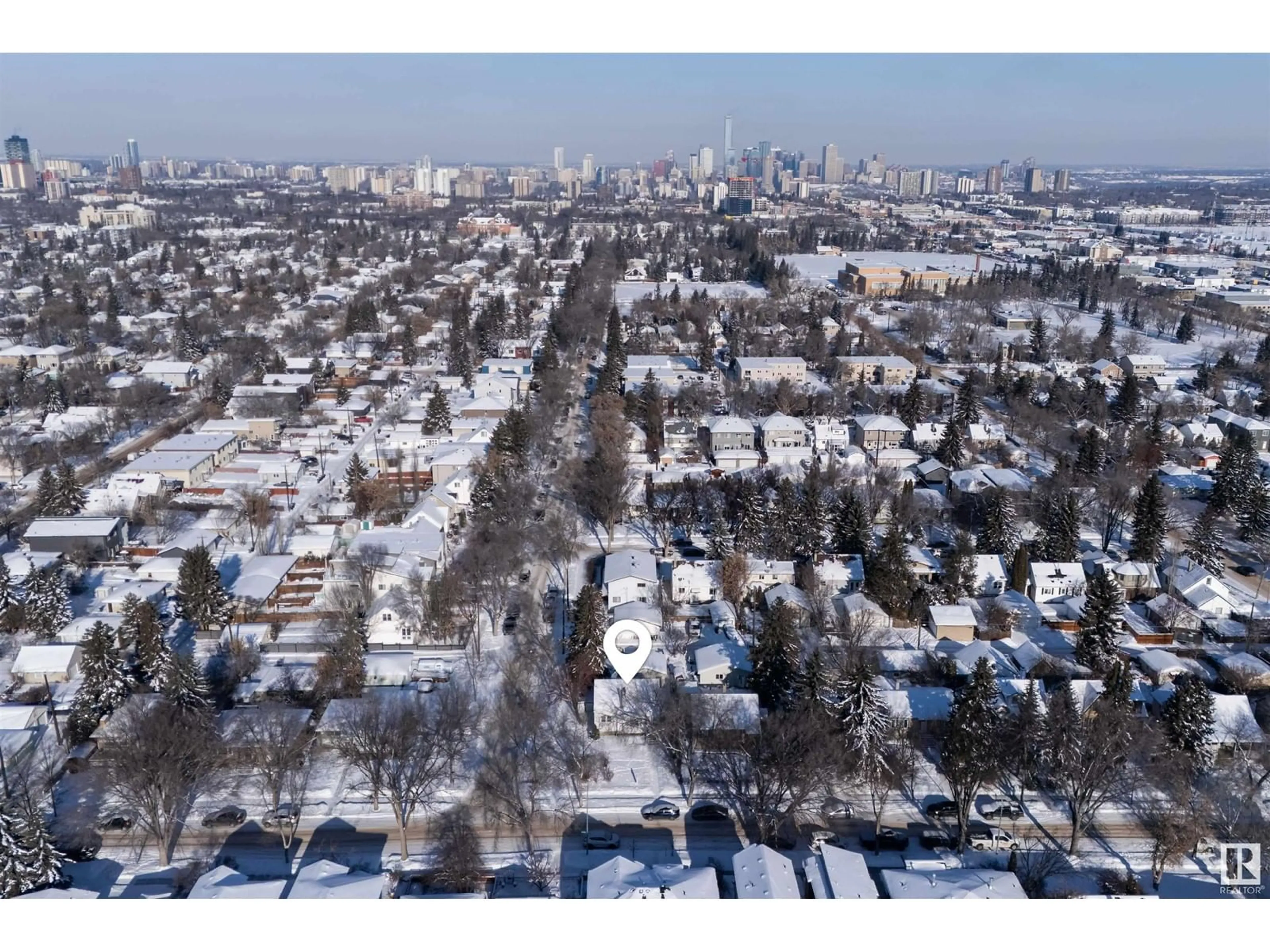 A pic from outside/outdoor area/front of a property/back of a property/a pic from drone, street for 10536 67 AV NW, Edmonton Alberta T6H1Z5