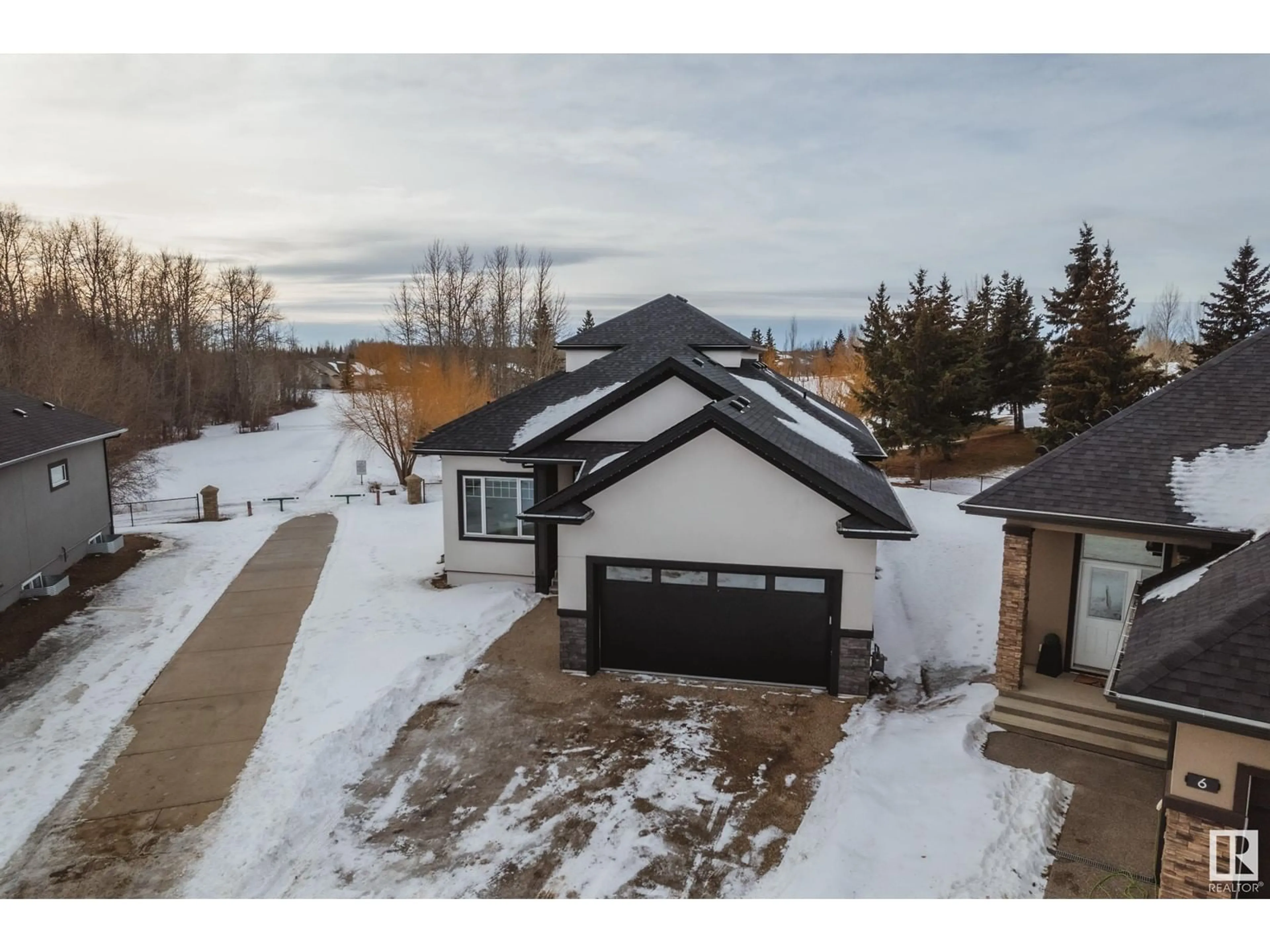 A pic from outside/outdoor area/front of a property/back of a property/a pic from drone, street for #7 20425 93 AV NW, Edmonton Alberta T5T7C7