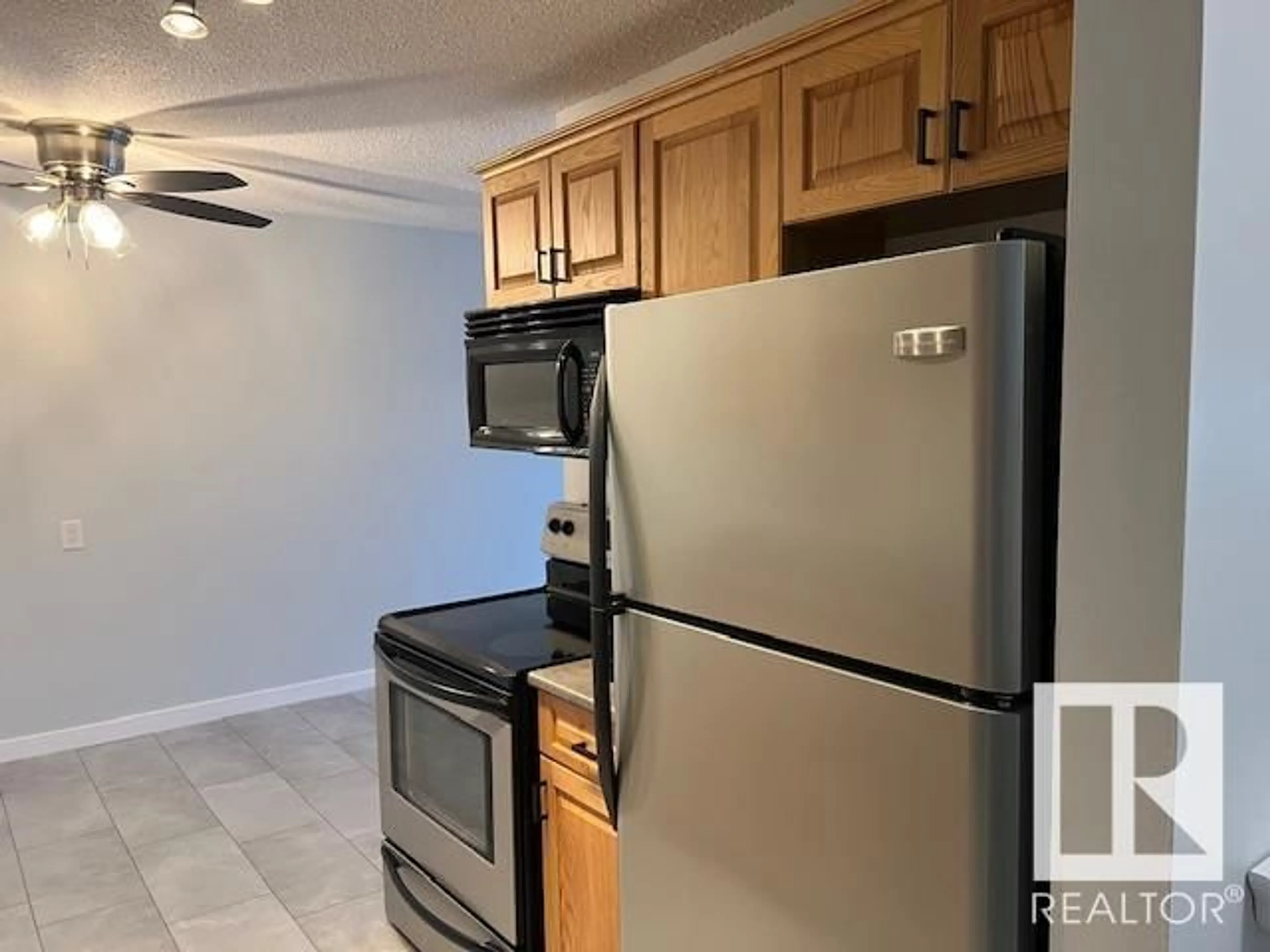 Standard kitchen, ceramic/tile floor for #303 10740 105 ST NW, Edmonton Alberta T5H2X2