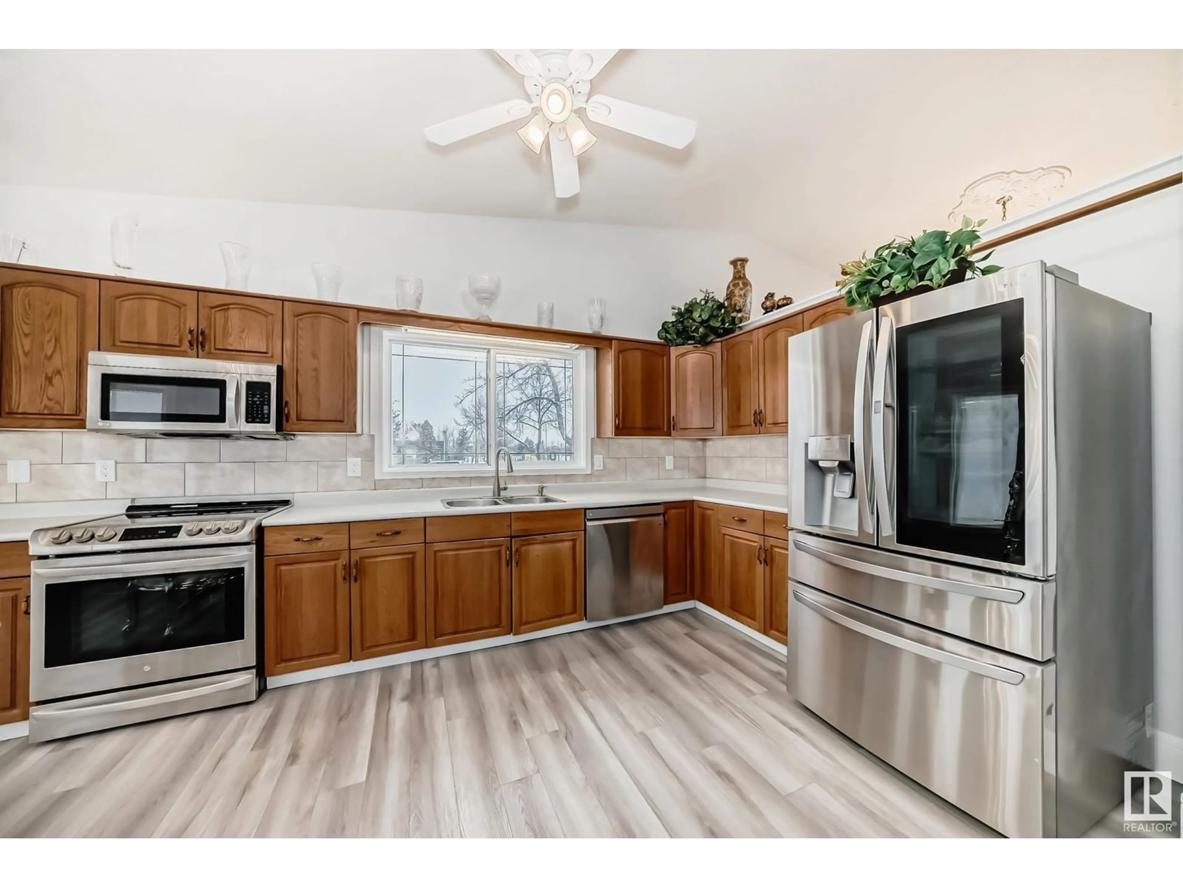 Open concept kitchen, unknown for 10735 BEAUMARIS RD NW, Edmonton Alberta T5X5P1