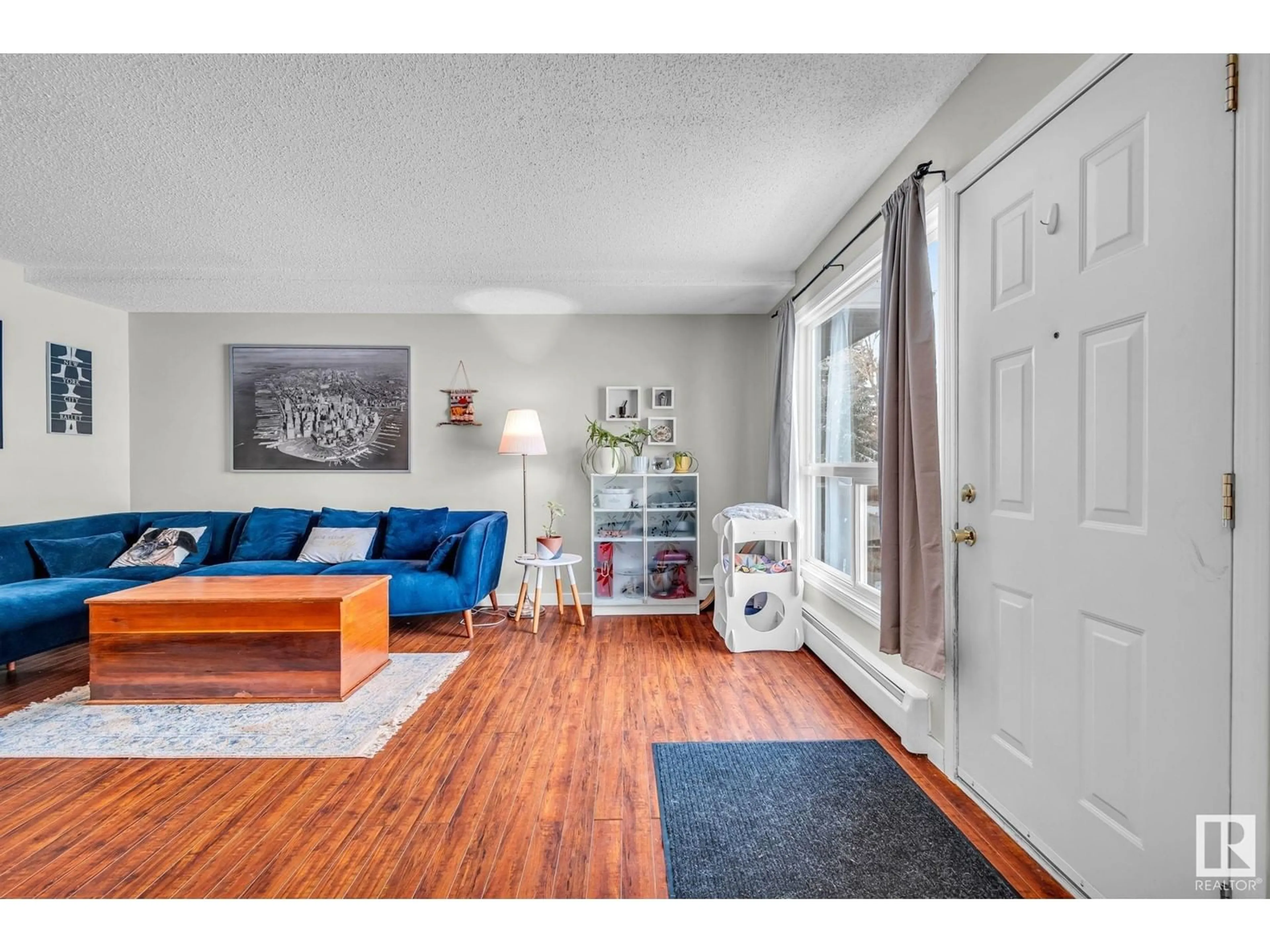 Living room with furniture, unknown for #115 237 WOODVALE RD W NW, Edmonton Alberta T6L1E5