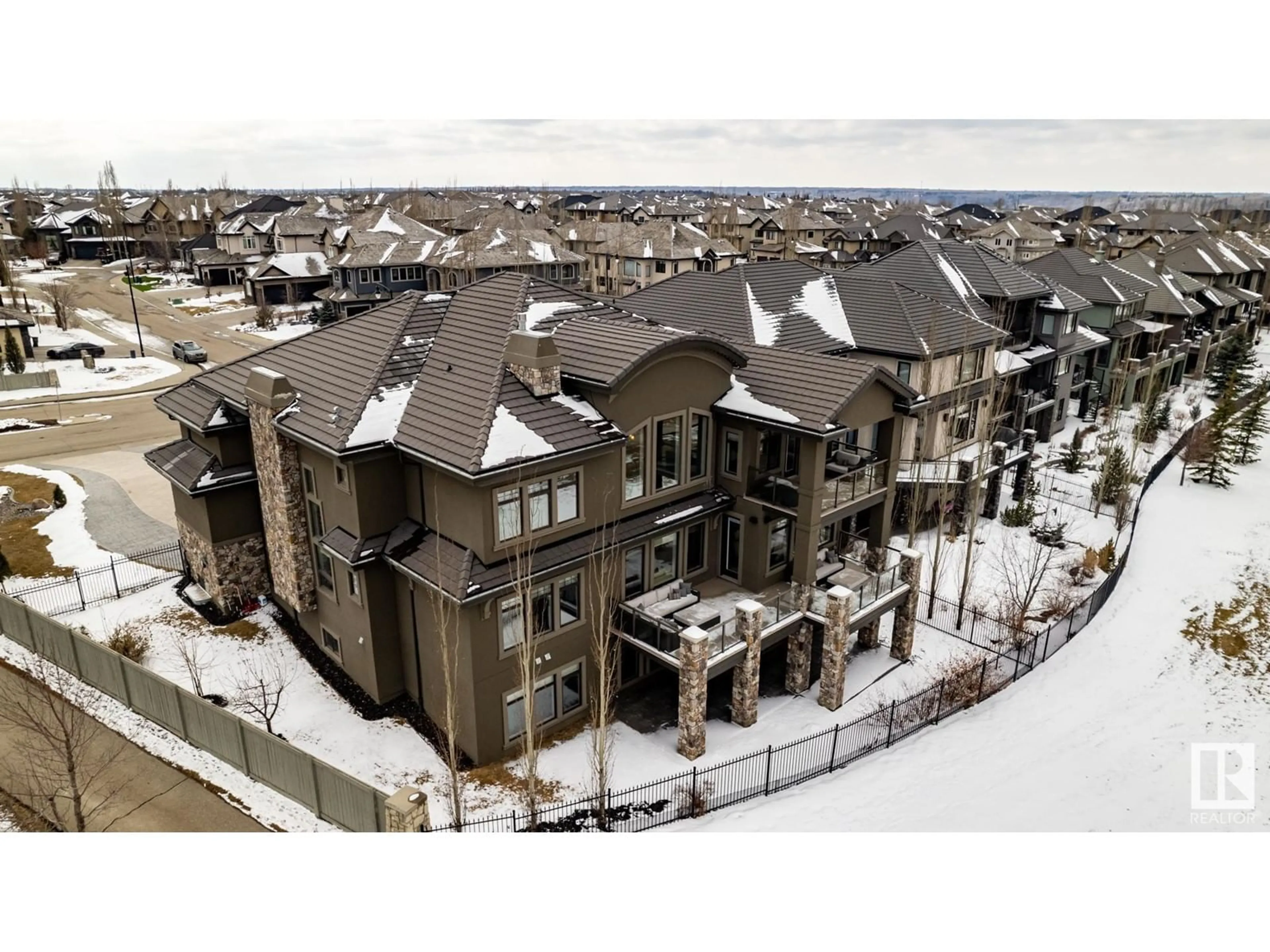 A pic from outside/outdoor area/front of a property/back of a property/a pic from drone, mountain view for 3104 WATSON GR SW, Edmonton Alberta T6W0P2