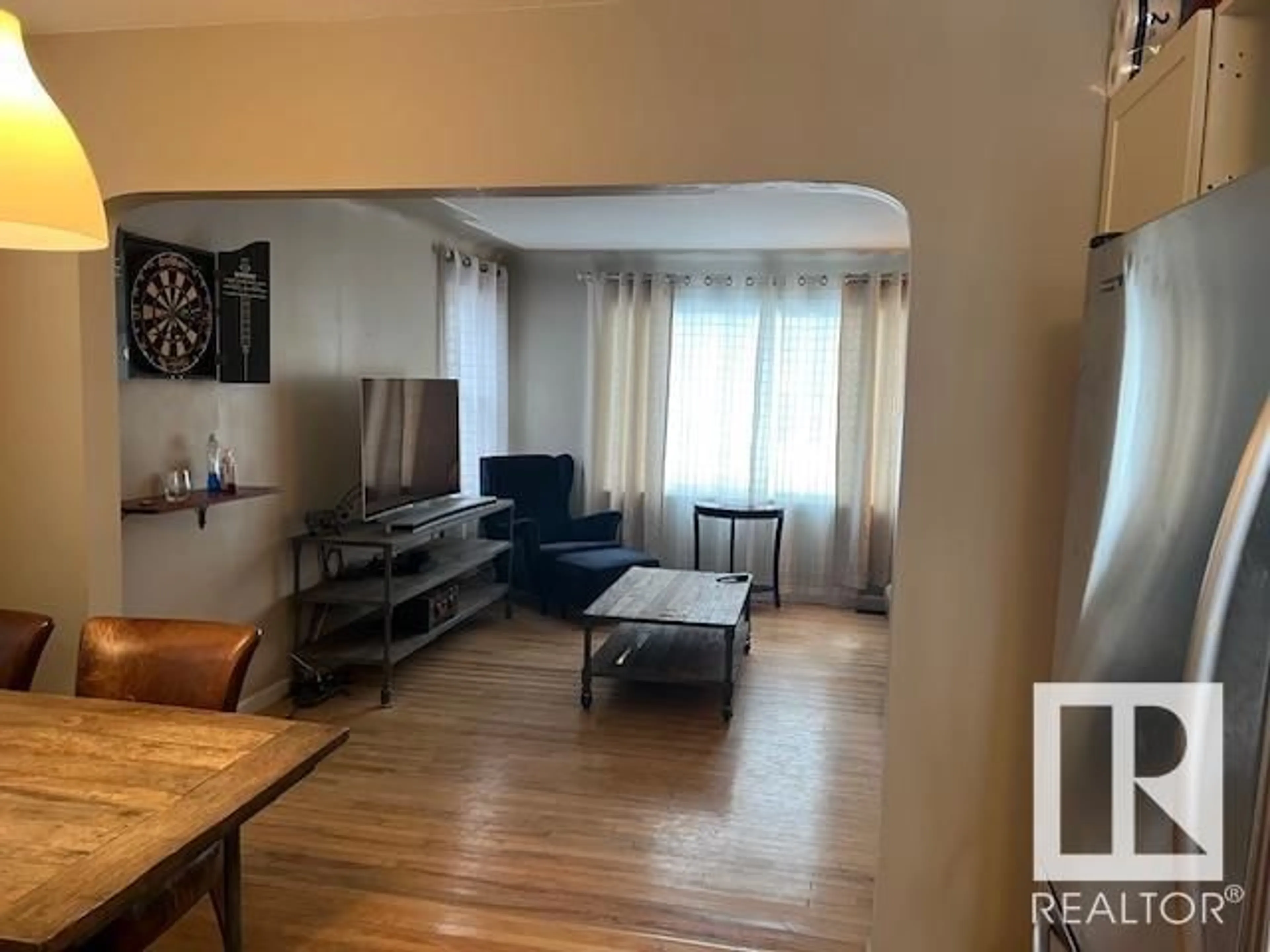 Living room with furniture, unknown for 10933 74 AV NW, Edmonton Alberta T6G0S5