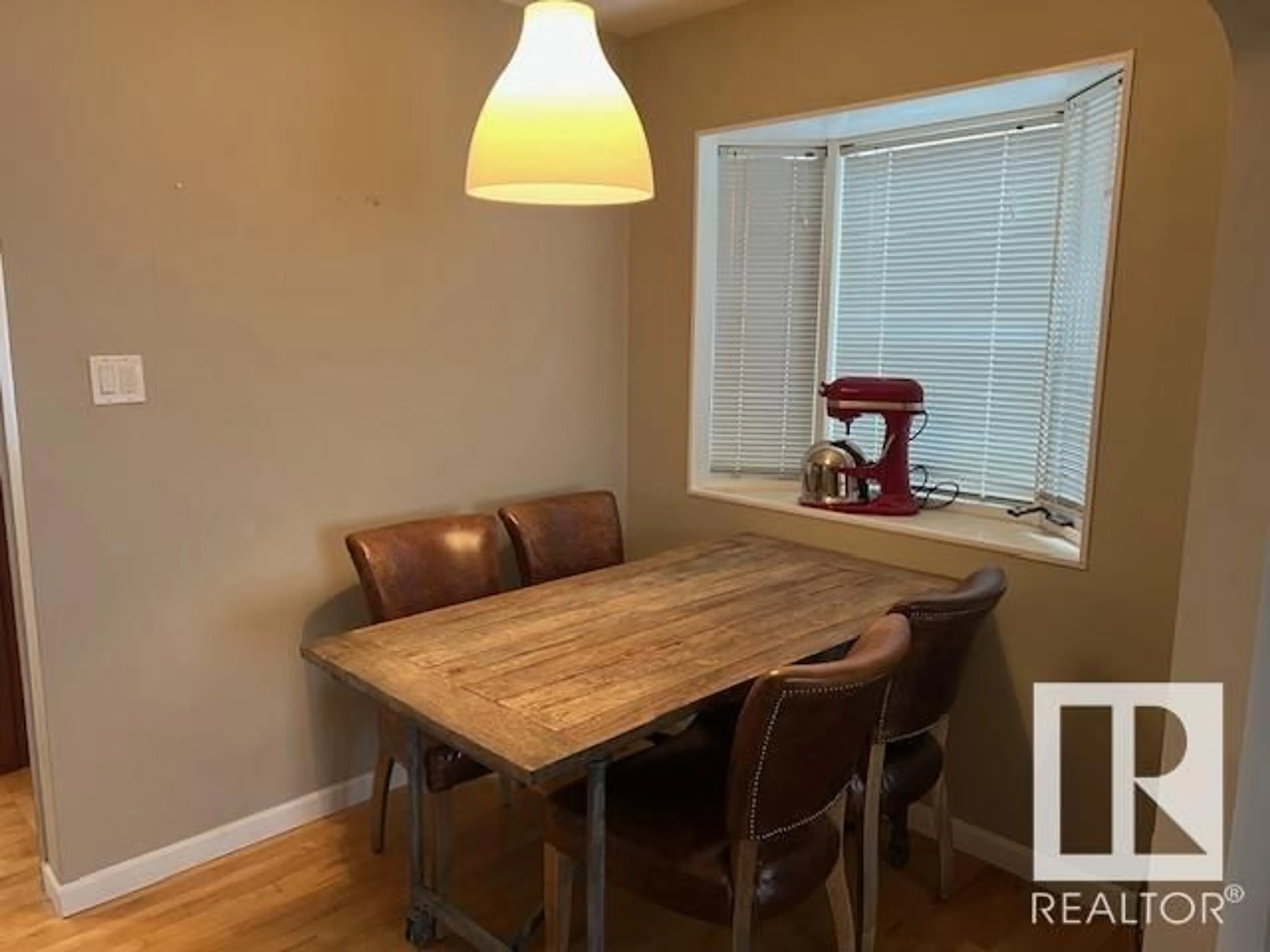 Dining room, wood/laminate floor for 10933 74 AV NW, Edmonton Alberta T6G0S5