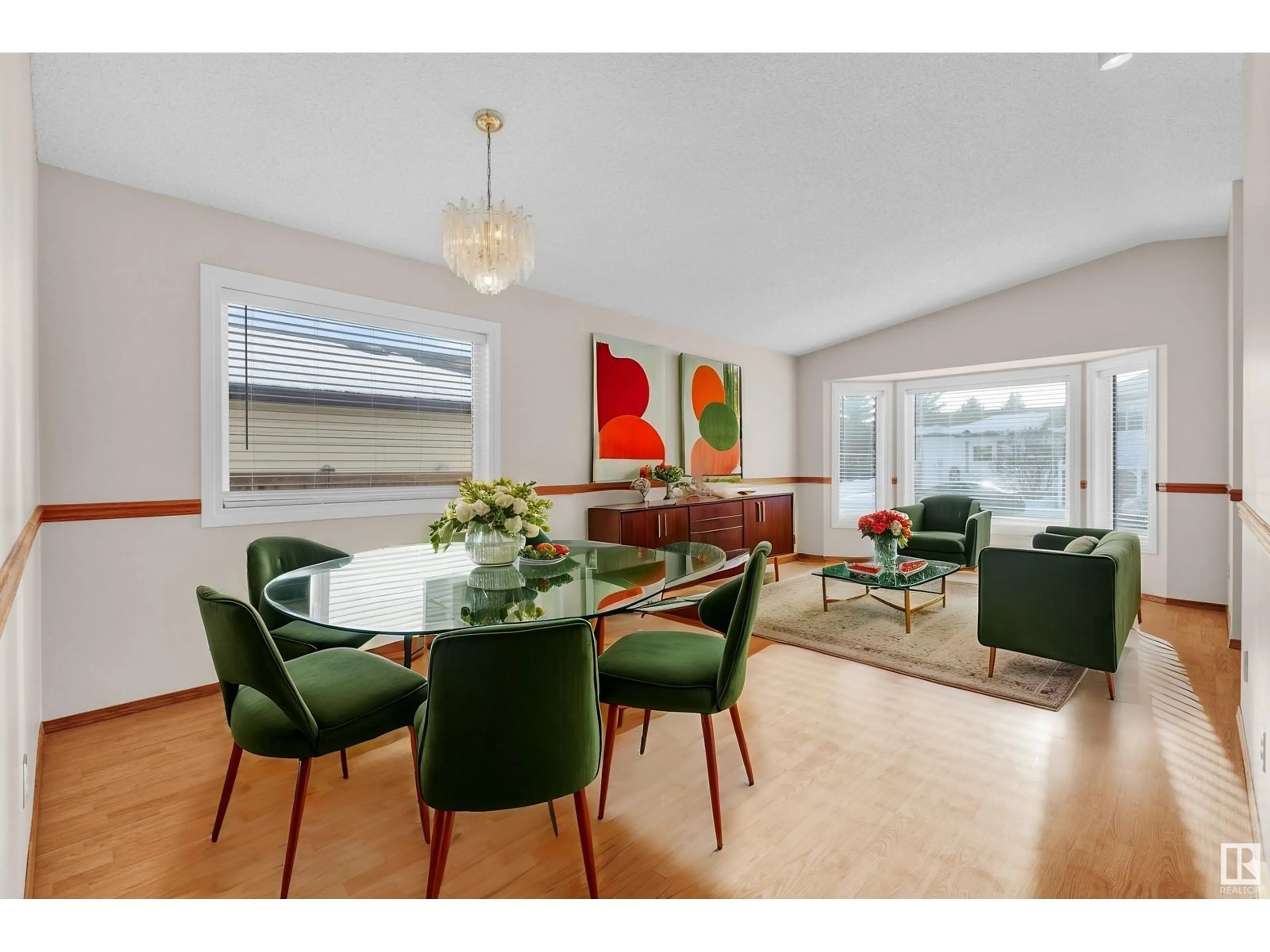 Dining room, wood/laminate floor for 4210 33A AV NW, Edmonton Alberta T6L6A3