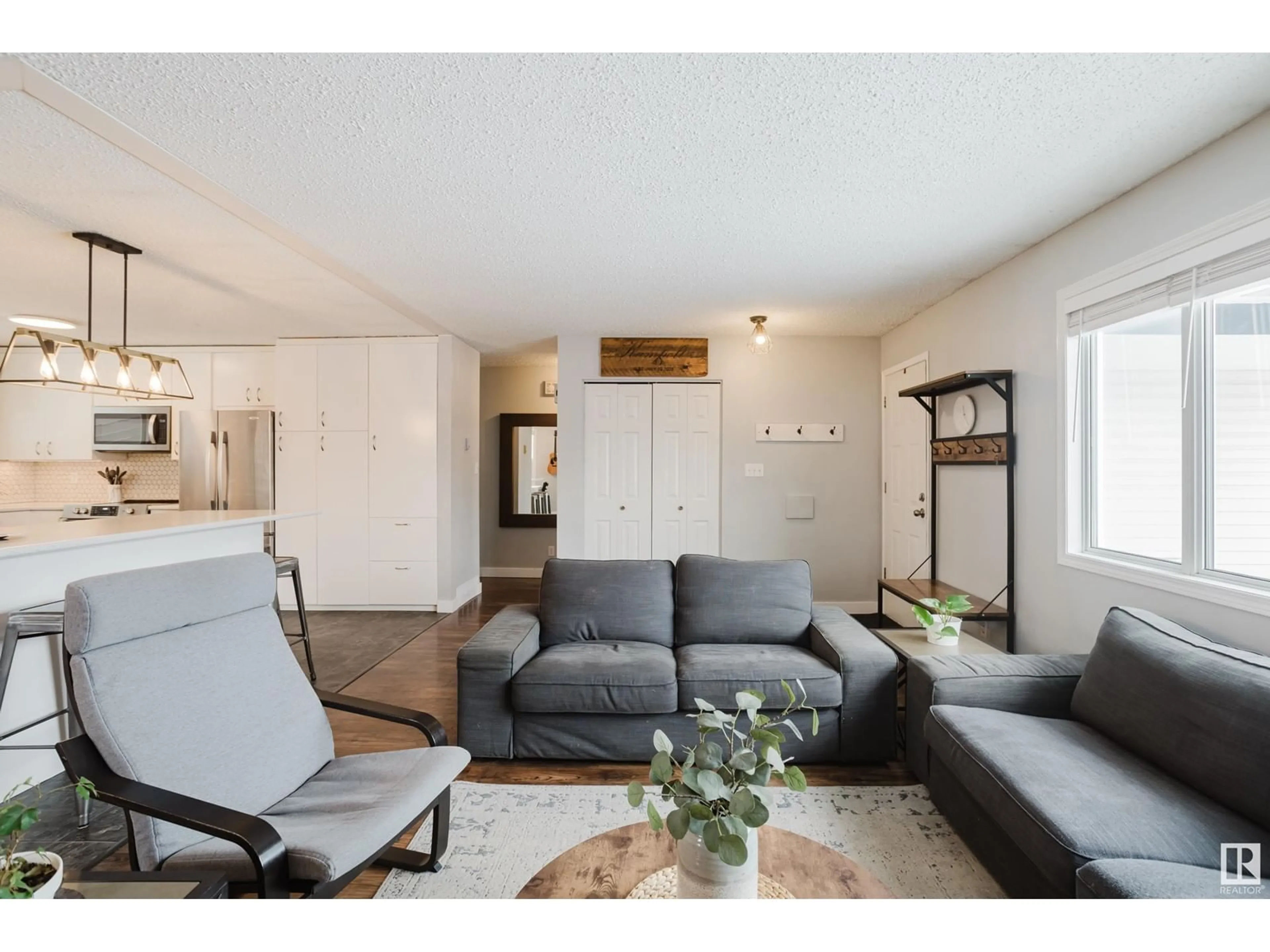 Living room with furniture, unknown for 1036 77 ST NW, Edmonton Alberta T6K2R8