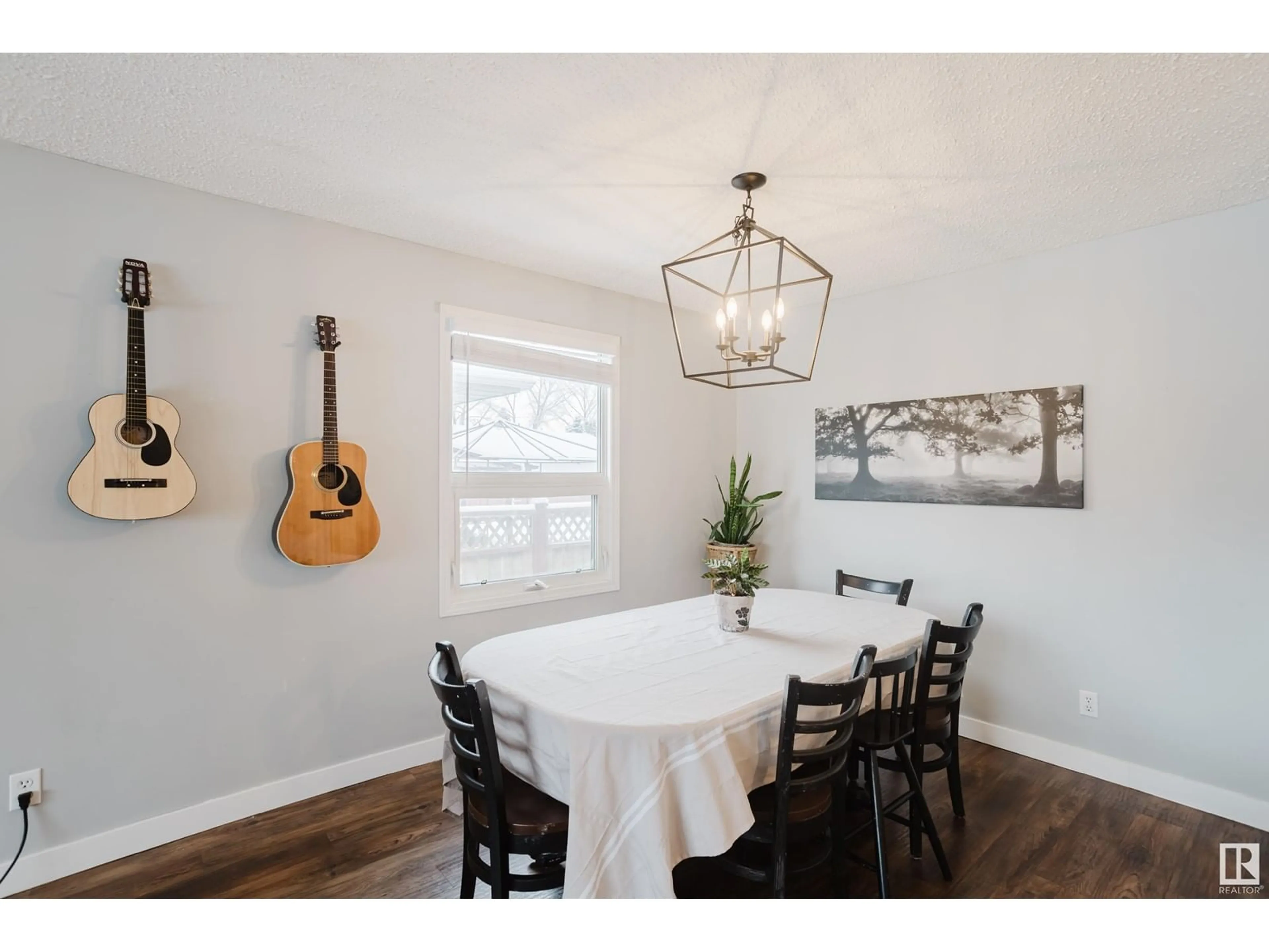 Dining room, wood/laminate floor for 1036 77 ST NW, Edmonton Alberta T6K2R8