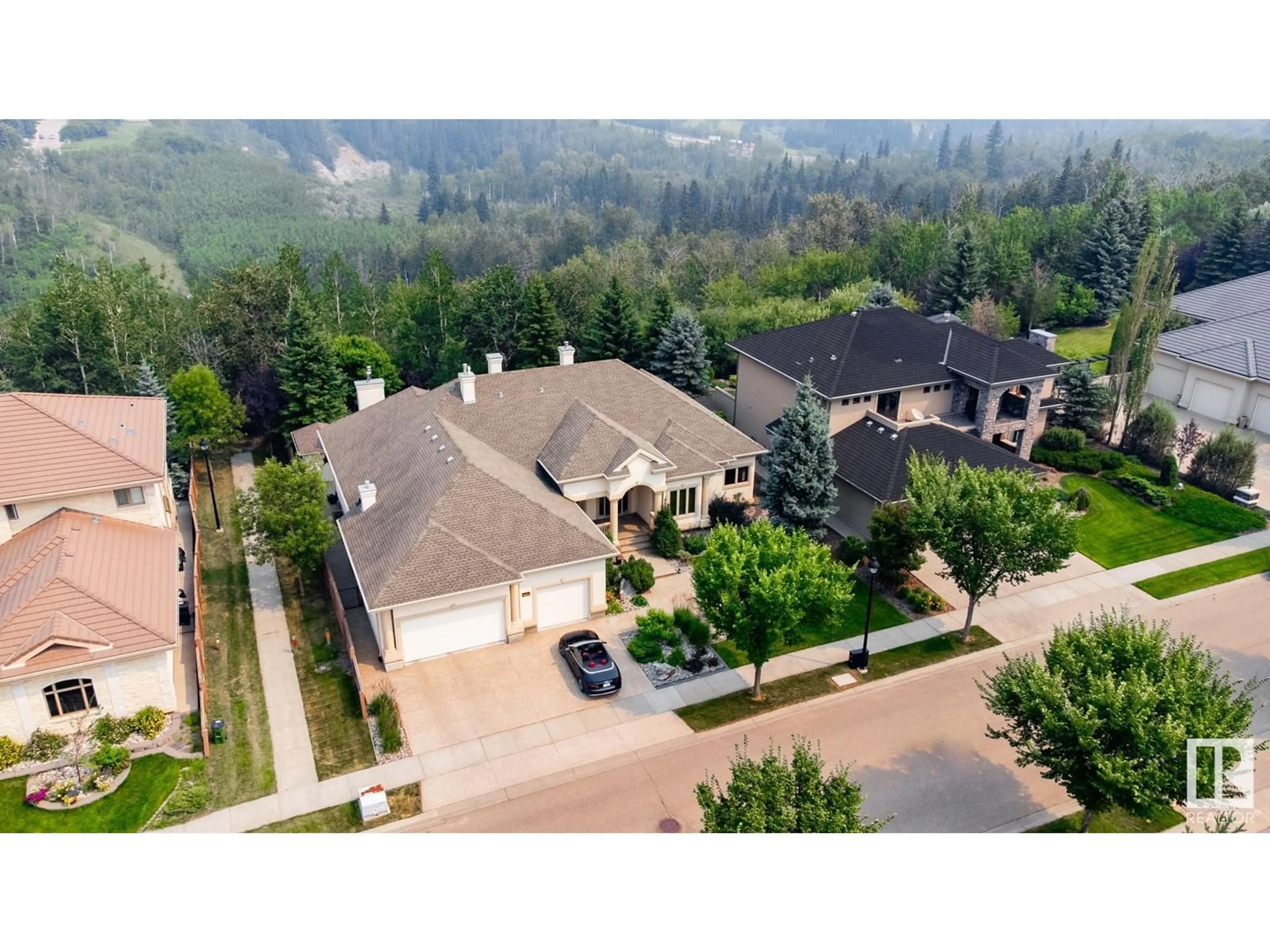 A pic from outside/outdoor area/front of a property/back of a property/a pic from drone, mountain view for 925 HOLLINGSWORTH BN NW, Edmonton Alberta T6R3L3