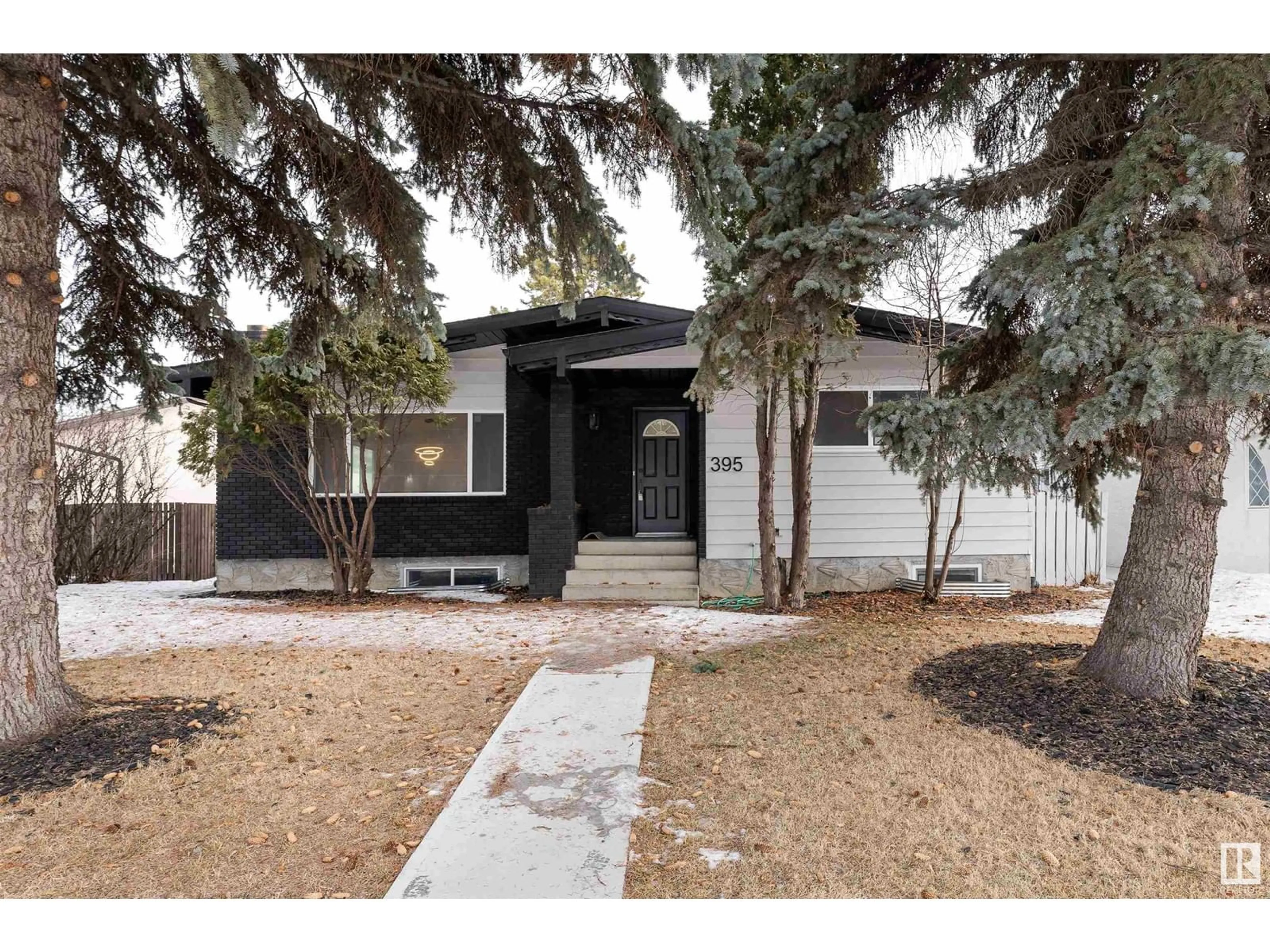 Home with vinyl exterior material, street for 395 KNOTTWOOD W NW, Edmonton Alberta T6K2G4