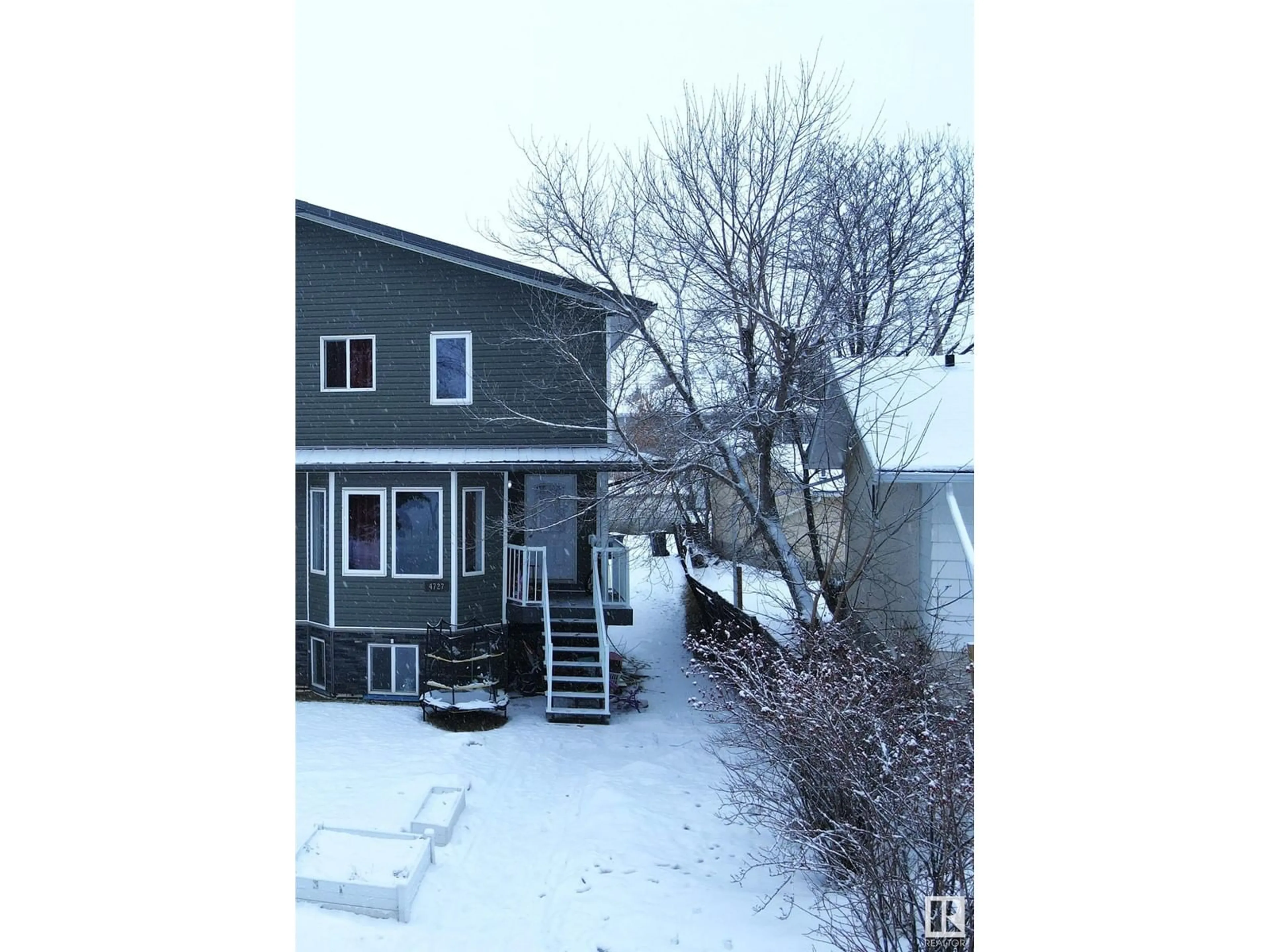 A pic from outside/outdoor area/front of a property/back of a property/a pic from drone, street for 4727 47A AV, Drayton Valley Alberta T7A1H9