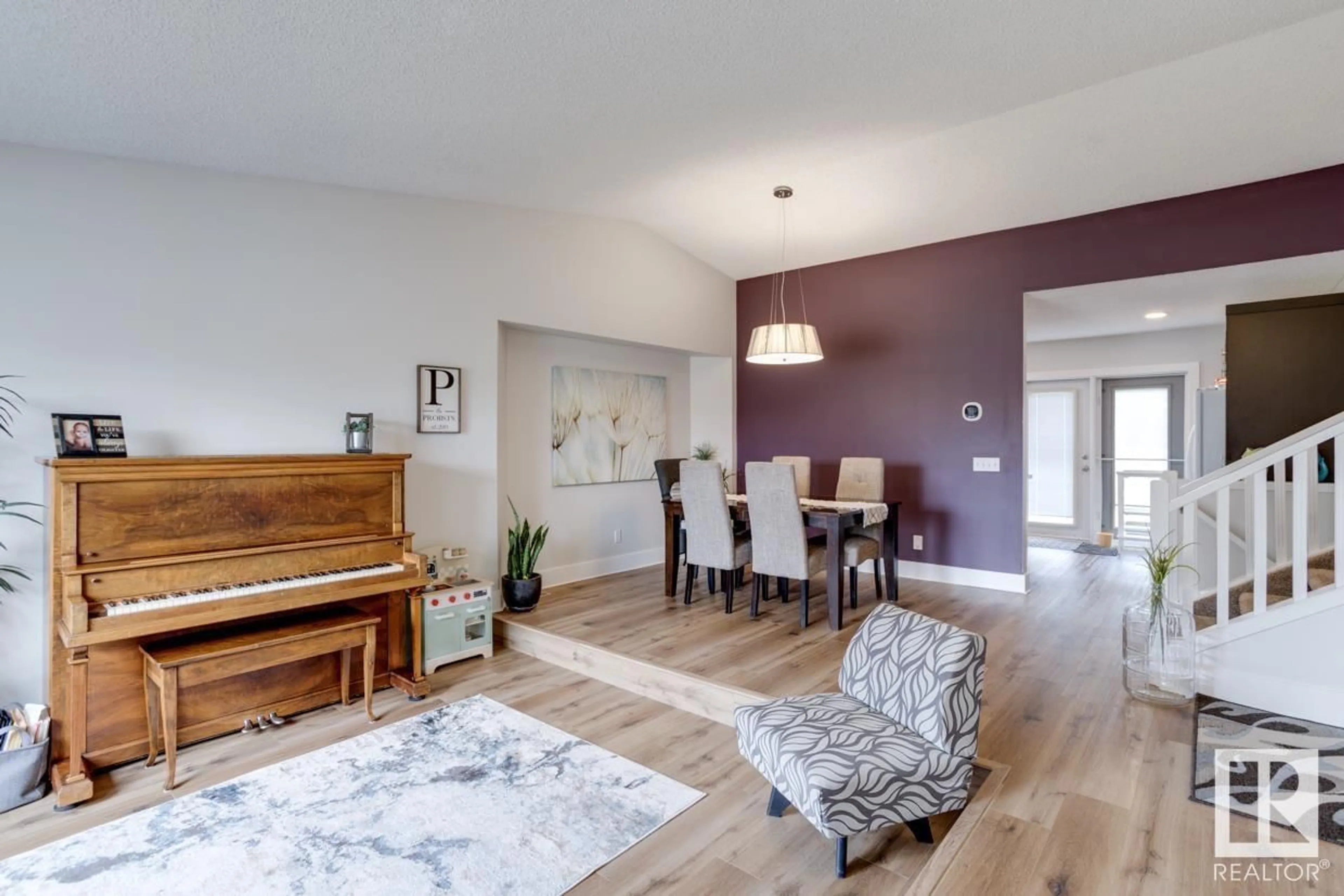 Living room with furniture, wood/laminate floor for 3903 34A AV NW, Edmonton Alberta T6L3Z3