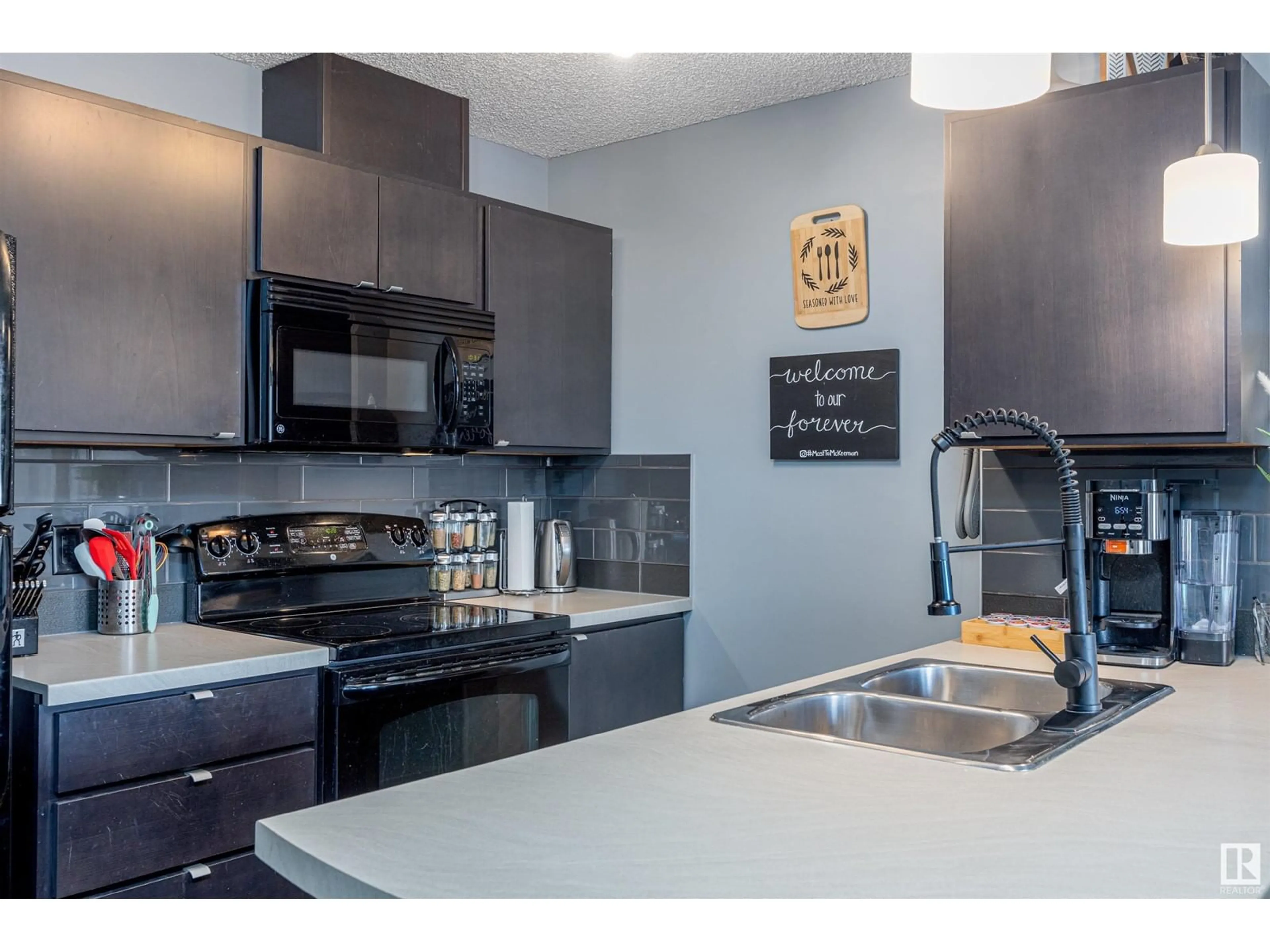 Open concept kitchen, unknown for #446 1196 Hyndman RD NW NW, Edmonton Alberta T5A0X8