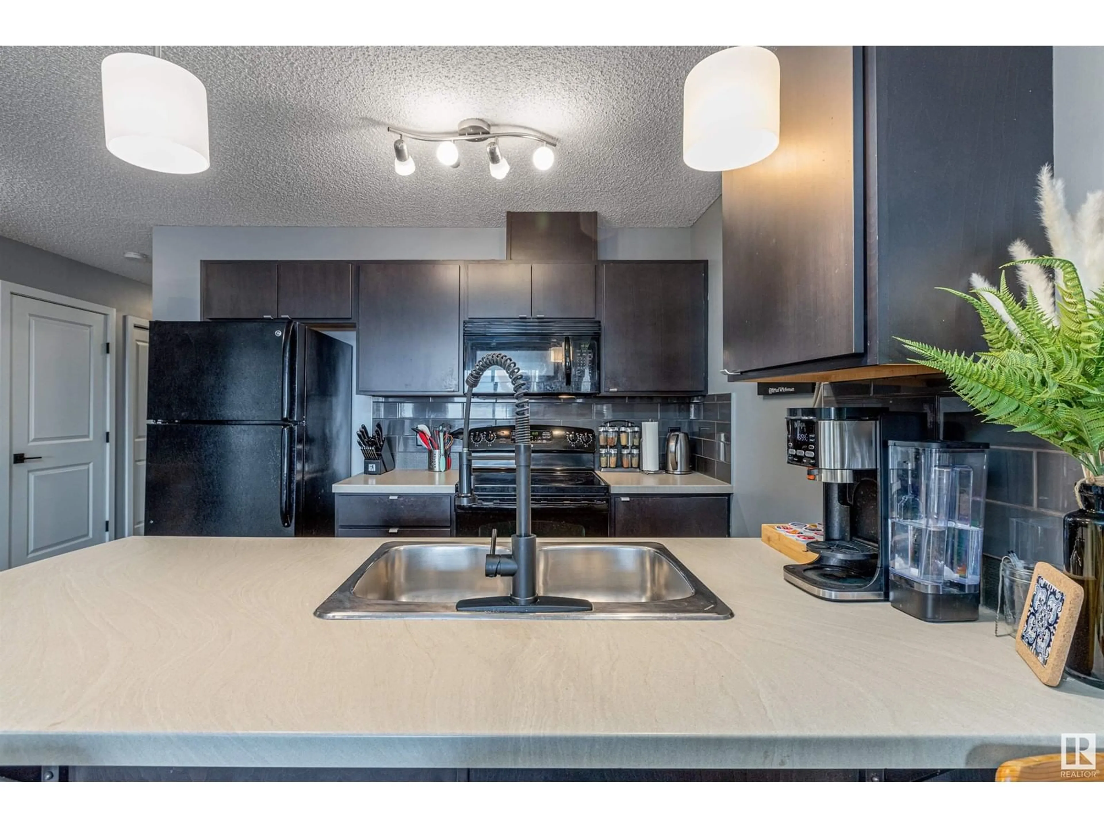 Open concept kitchen, unknown for #446 1196 Hyndman RD NW NW, Edmonton Alberta T5A0X8