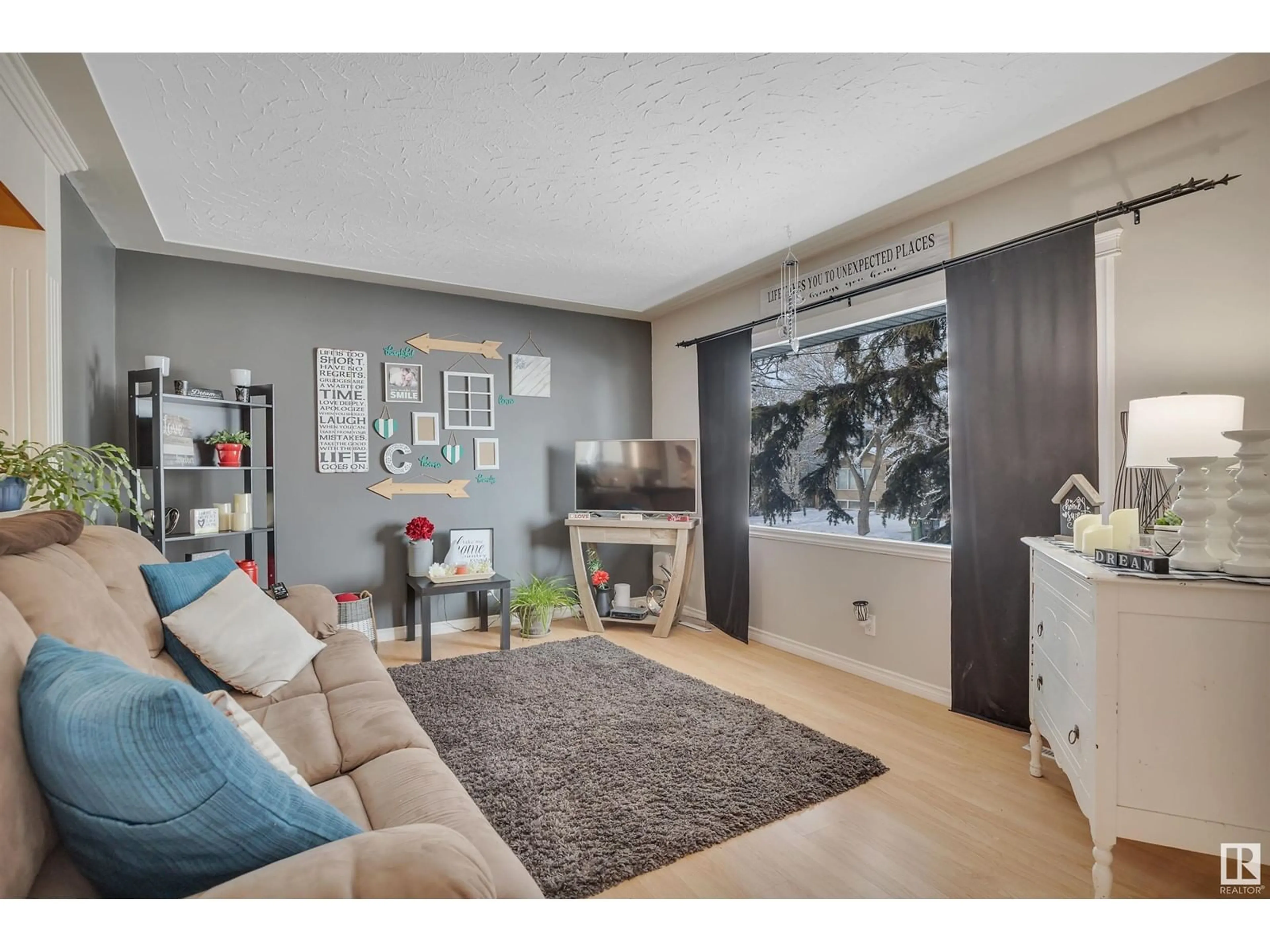 Living room with furniture, unknown for 4701 47 AV, Leduc Alberta T9E5X9