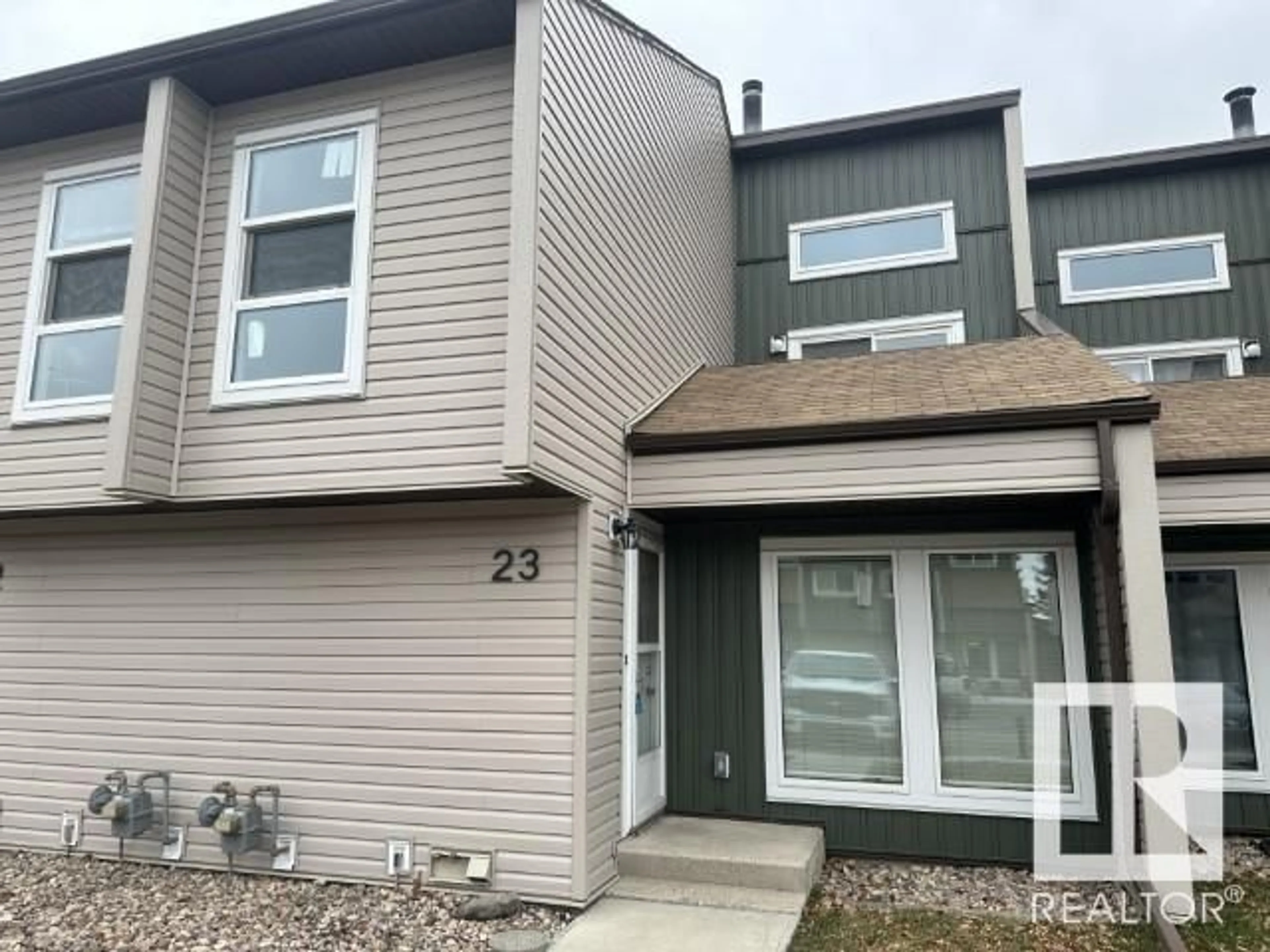 Home with vinyl exterior material, street for #23 2020 105 ST NW, Edmonton Alberta T6J5J2