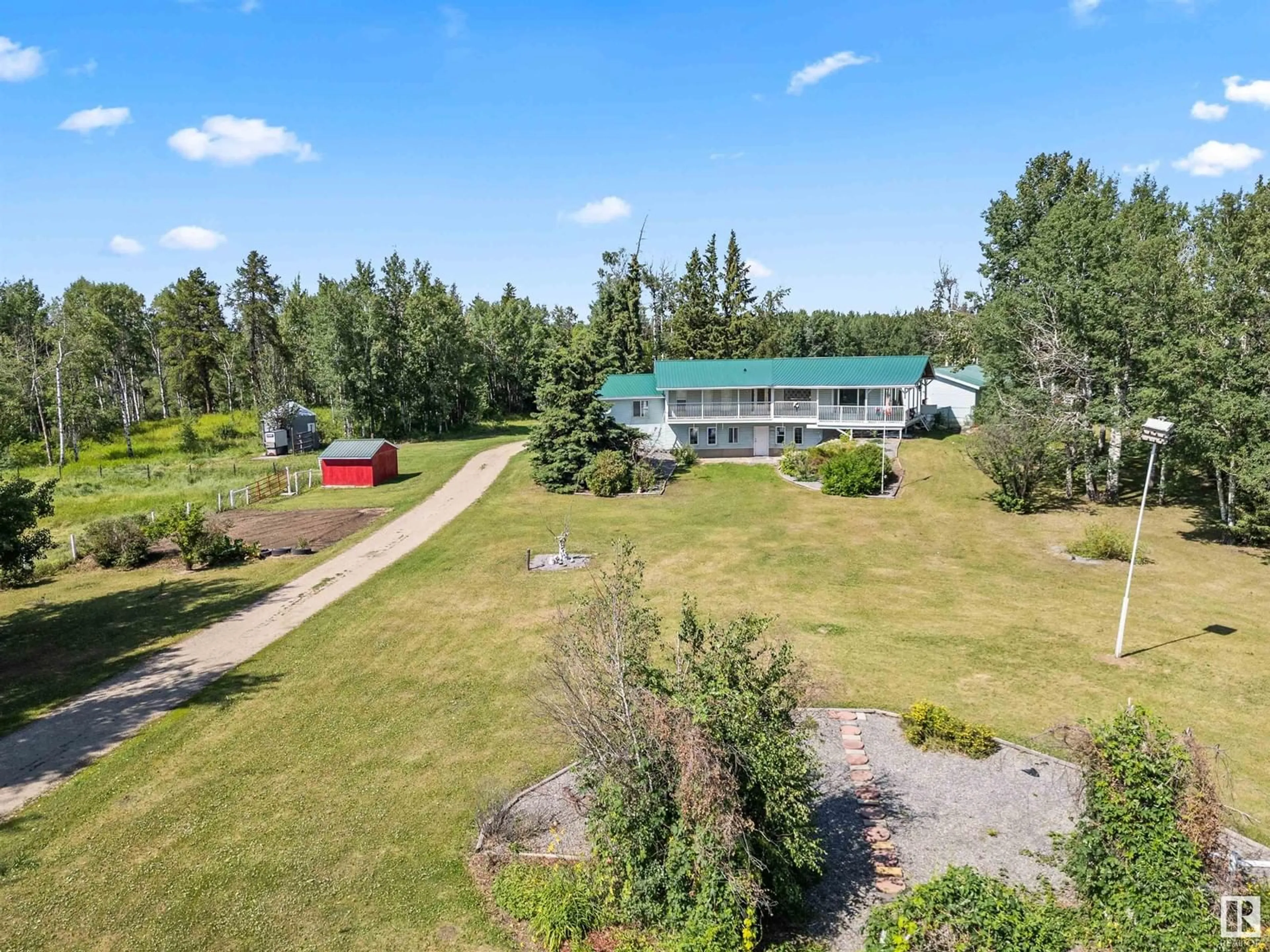 A pic from outside/outdoor area/front of a property/back of a property/a pic from drone, unknown for 5230 TWP 510, Rural Parkland County Alberta T0E2H0