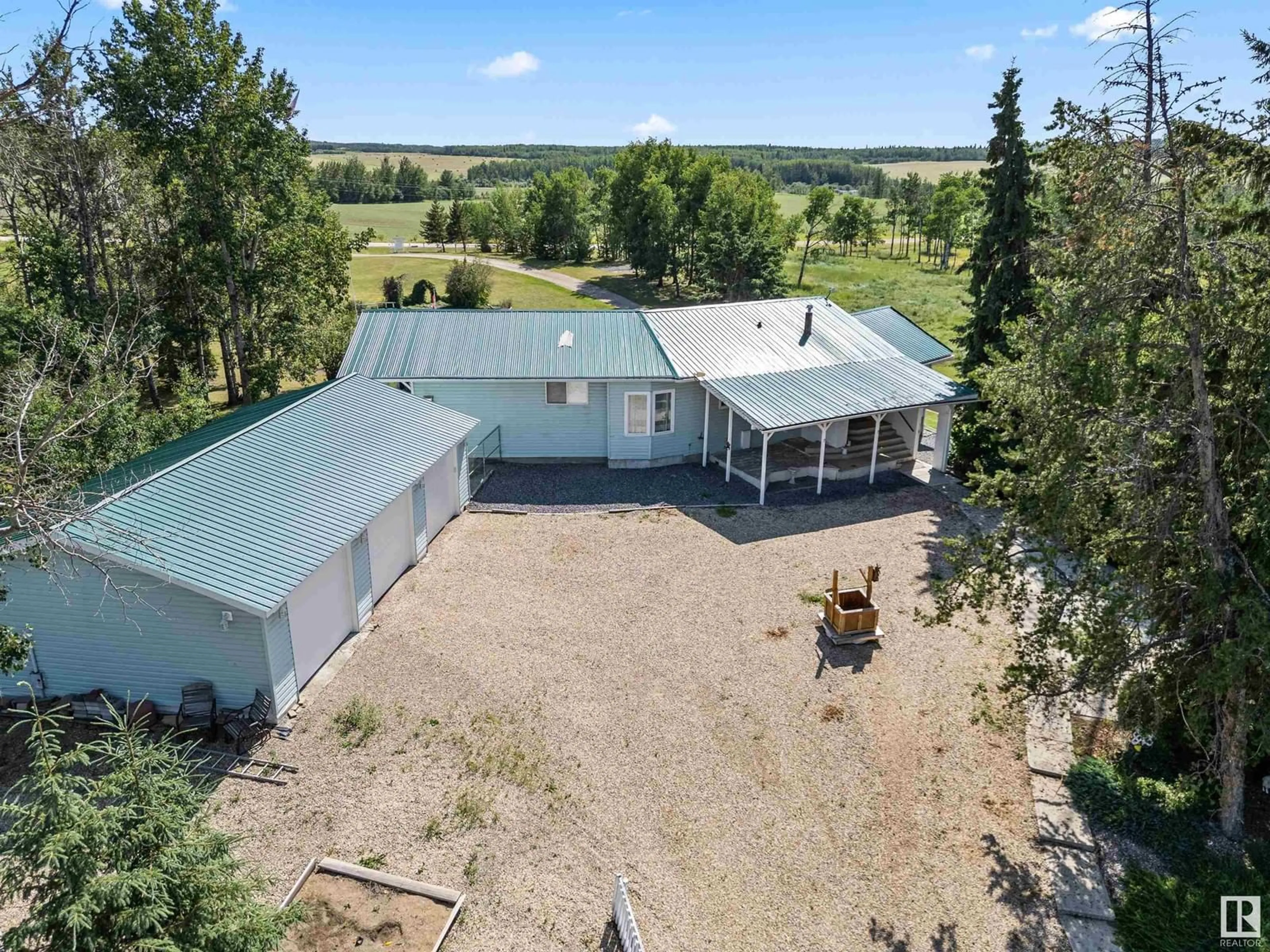 A pic from outside/outdoor area/front of a property/back of a property/a pic from drone, unknown for 5230 TWP 510, Rural Parkland County Alberta T0E2H0