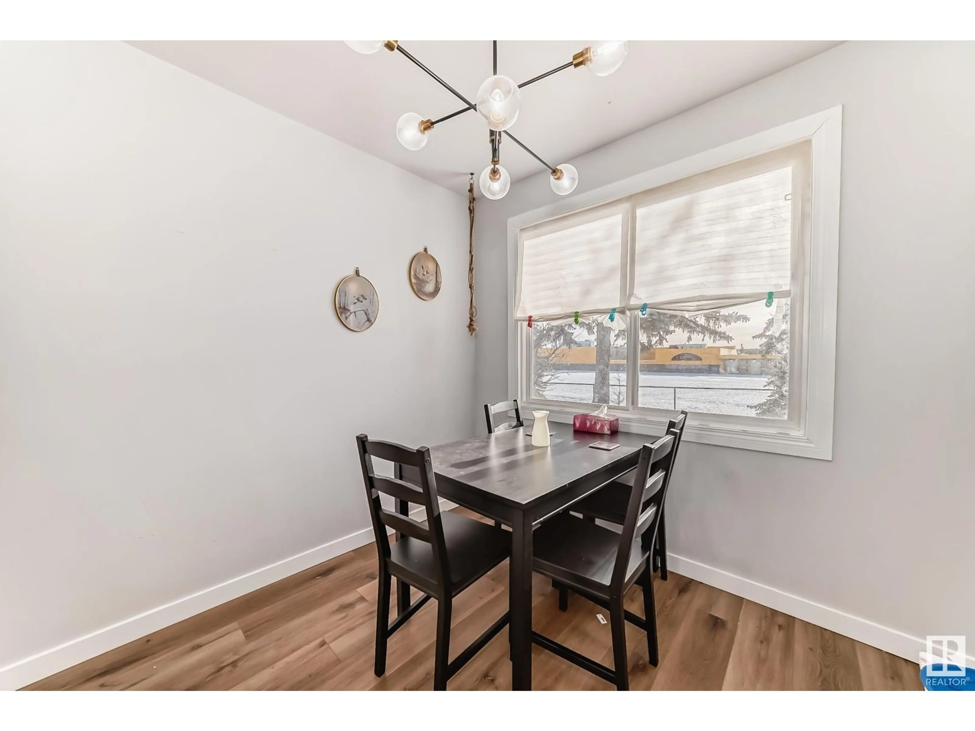 Dining room, wood/laminate floor for 175 LONDONDERRY SQUARE SQ NW, Edmonton Alberta T6L5L9