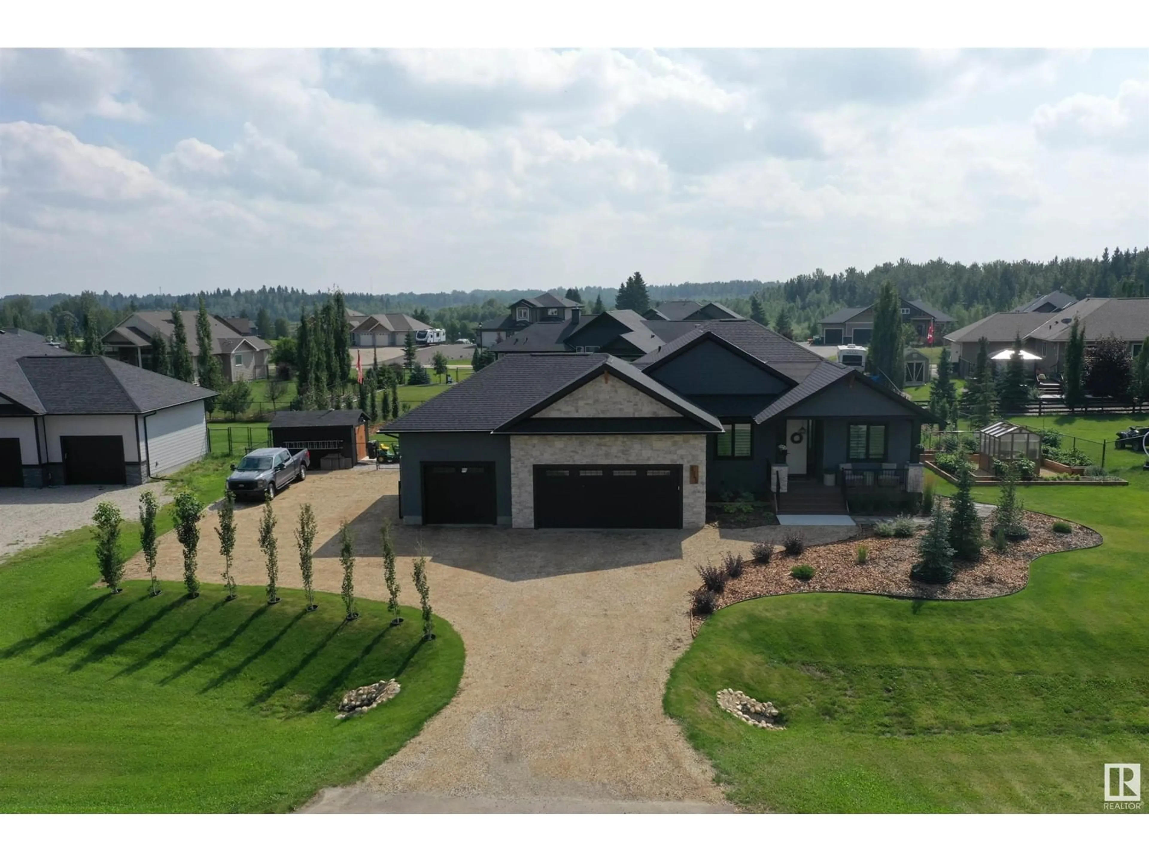 A pic from outside/outdoor area/front of a property/back of a property/a pic from drone, unknown for 2045 SPRUCE CR, Rural Parkland County Alberta T7Z0G8