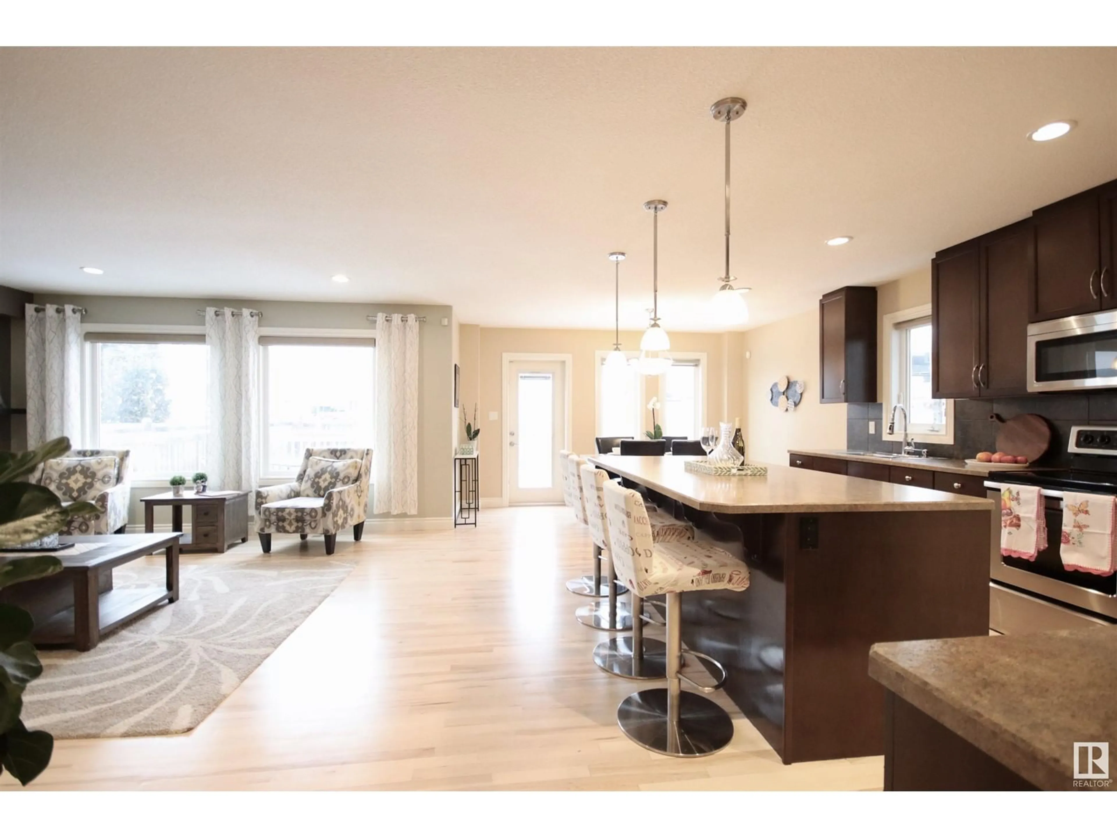 Open concept kitchen, ceramic/tile floor for 725 173B ST SW, Edmonton Alberta T6W0N1