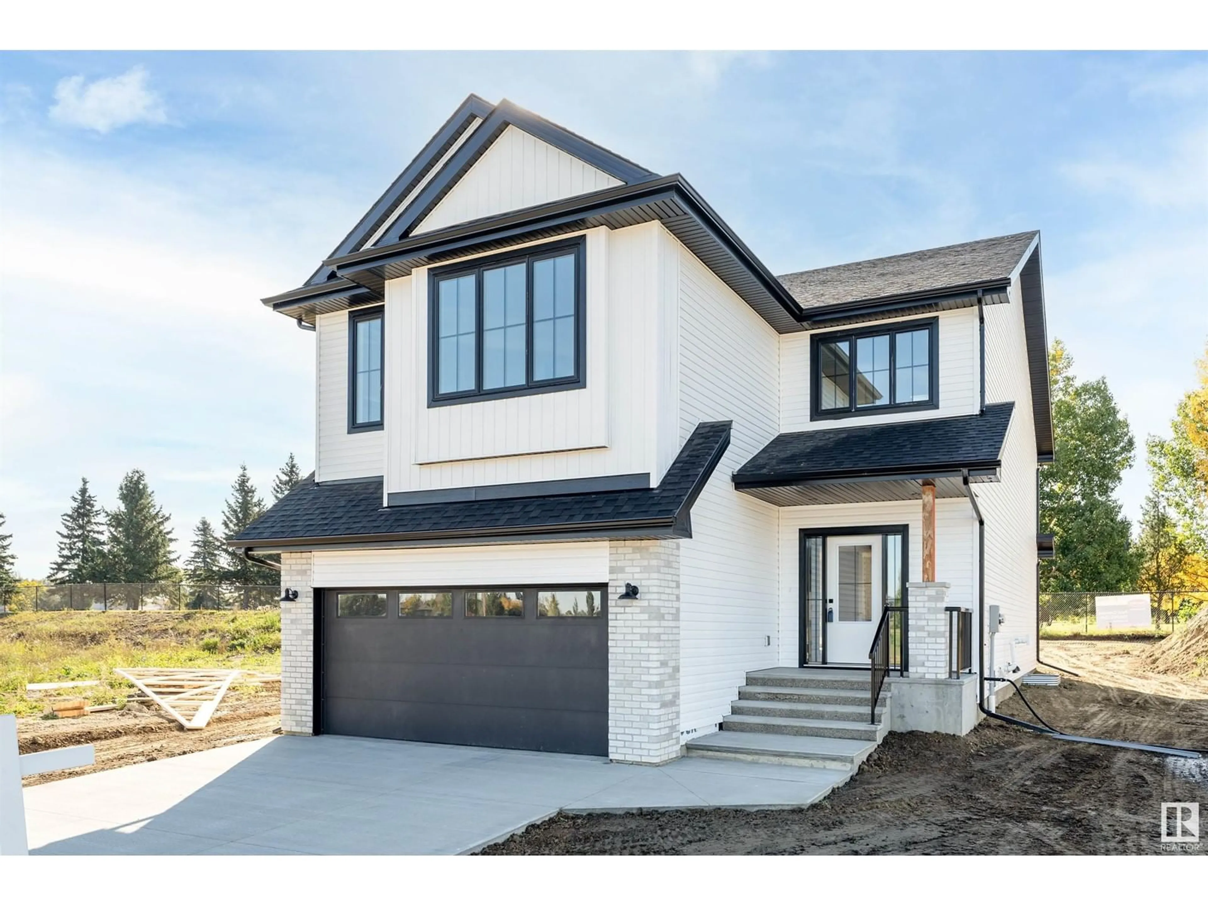 Home with vinyl exterior material, street for 134 GRAYBRIAR DR, Stony Plain Alberta T7Z2Z2