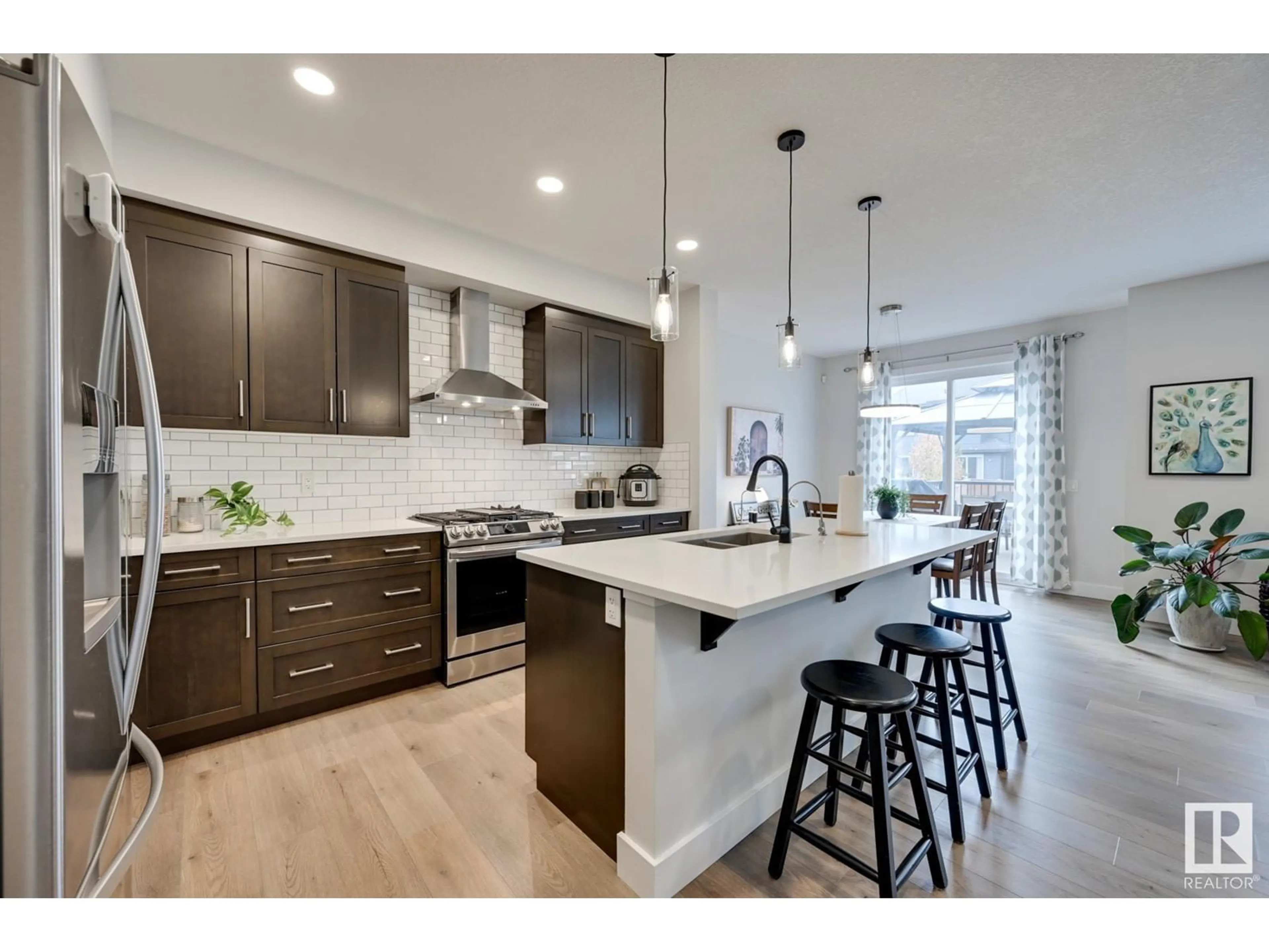 Open concept kitchen, unknown for 15651 14 AV SW, Edmonton Alberta T6W4E4