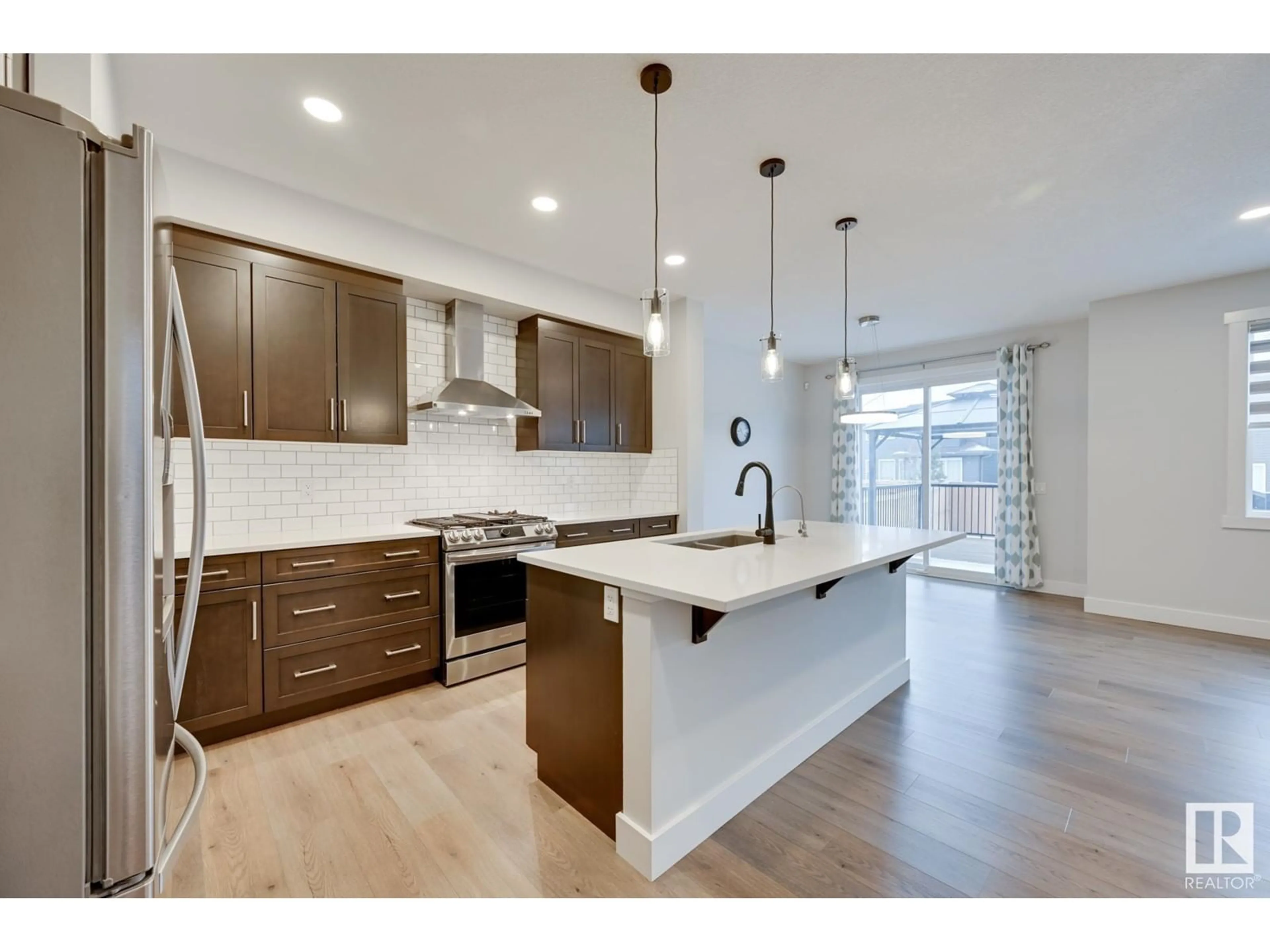 Open concept kitchen, unknown for 15651 14 AV SW, Edmonton Alberta T6W4E4