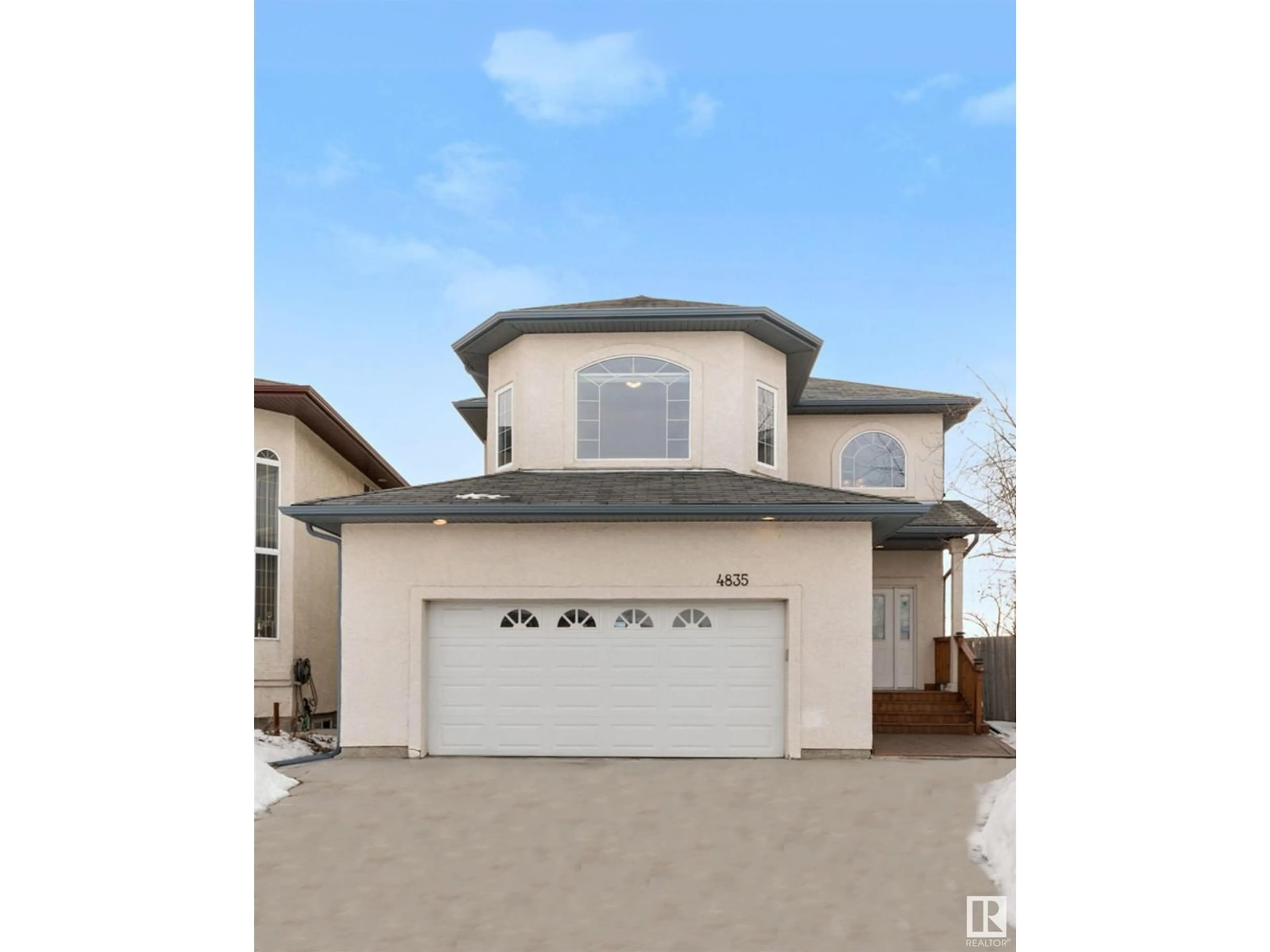 Home with vinyl exterior material, street for 4835 154 AV NW, Edmonton Alberta T5Y0C1