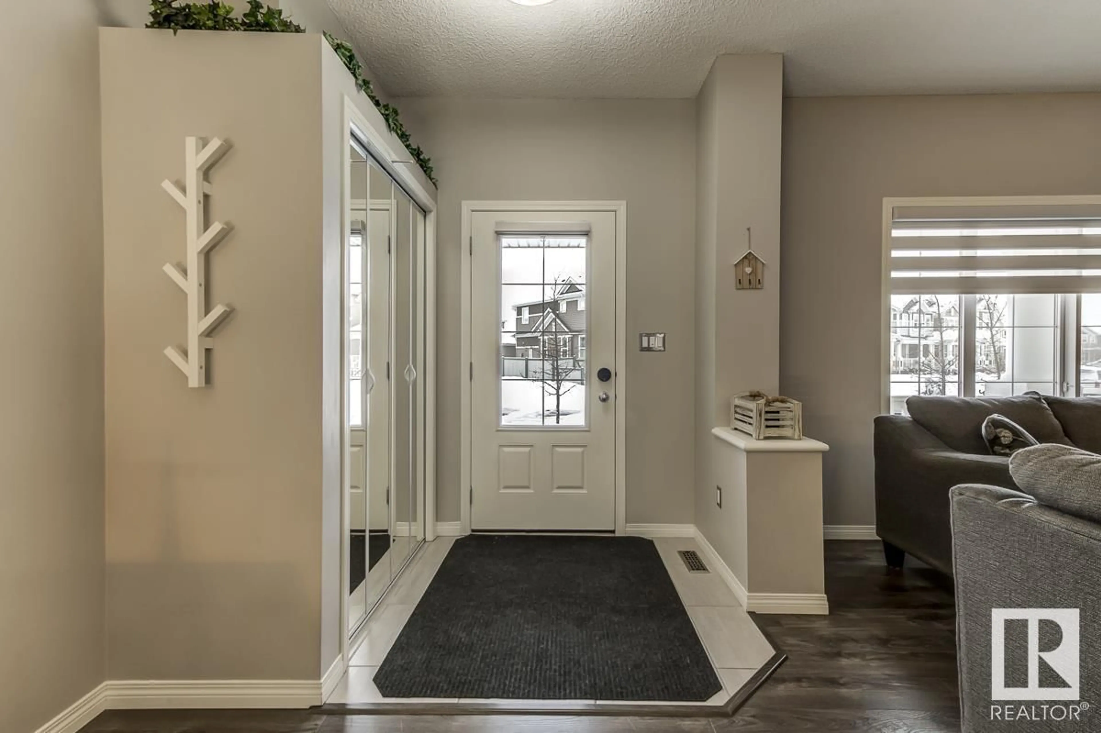 Indoor entryway for 2303 83 ST SW, Edmonton Alberta T6X1A2