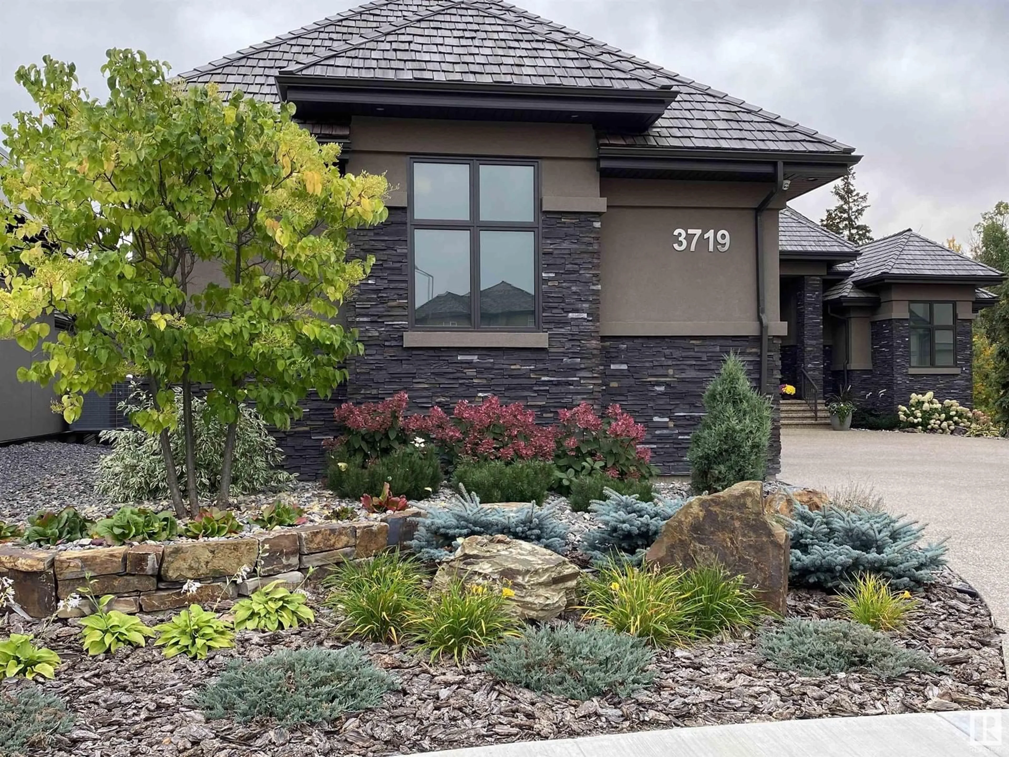A pic from outside/outdoor area/front of a property/back of a property/a pic from drone, mountain view for 3719 CAMERON HEIGHTS PL, Edmonton Alberta T6M0R1