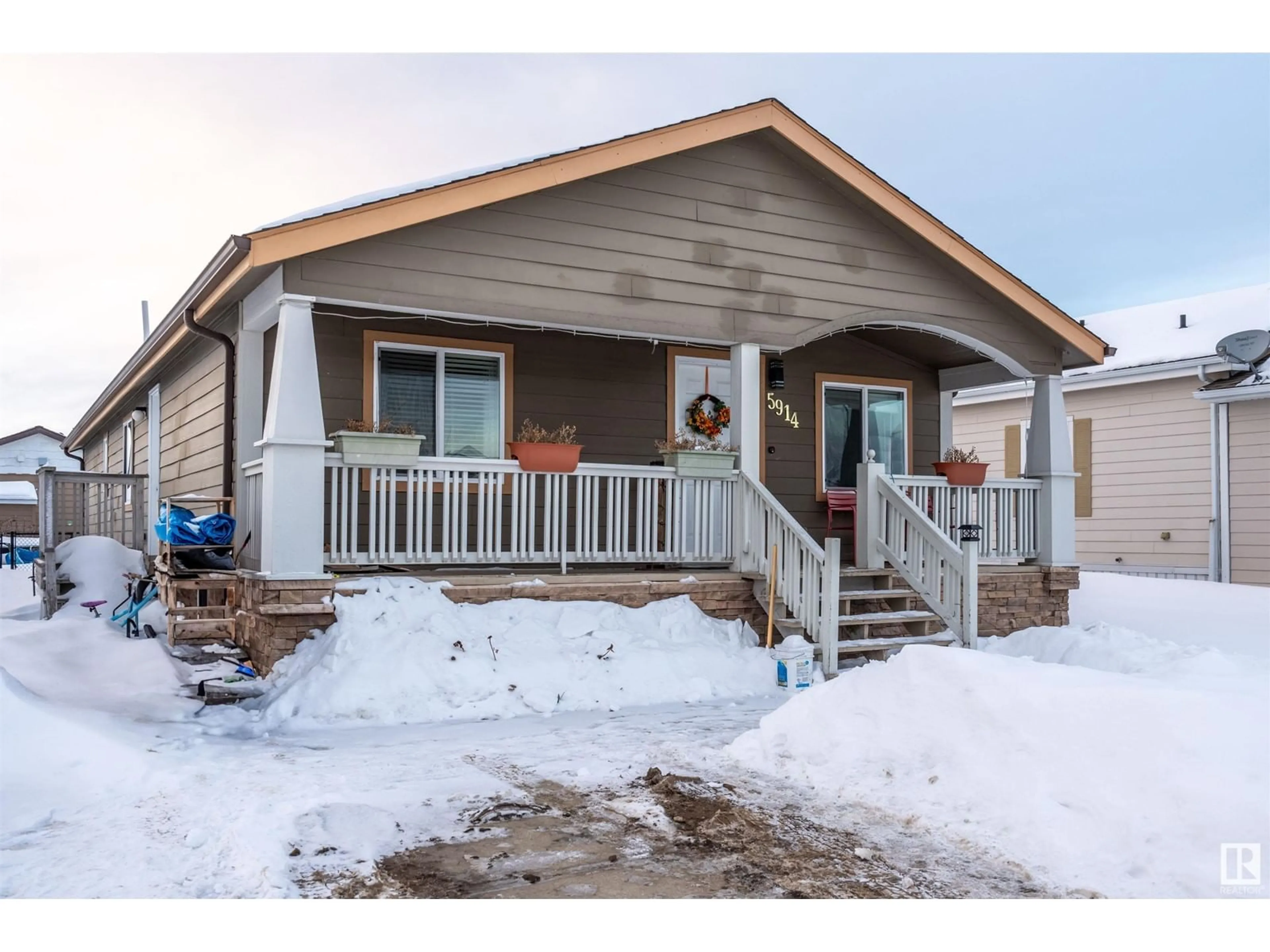 Home with vinyl exterior material, street for 5914 Fontaine DR, Cold Lake Alberta T9M0C6