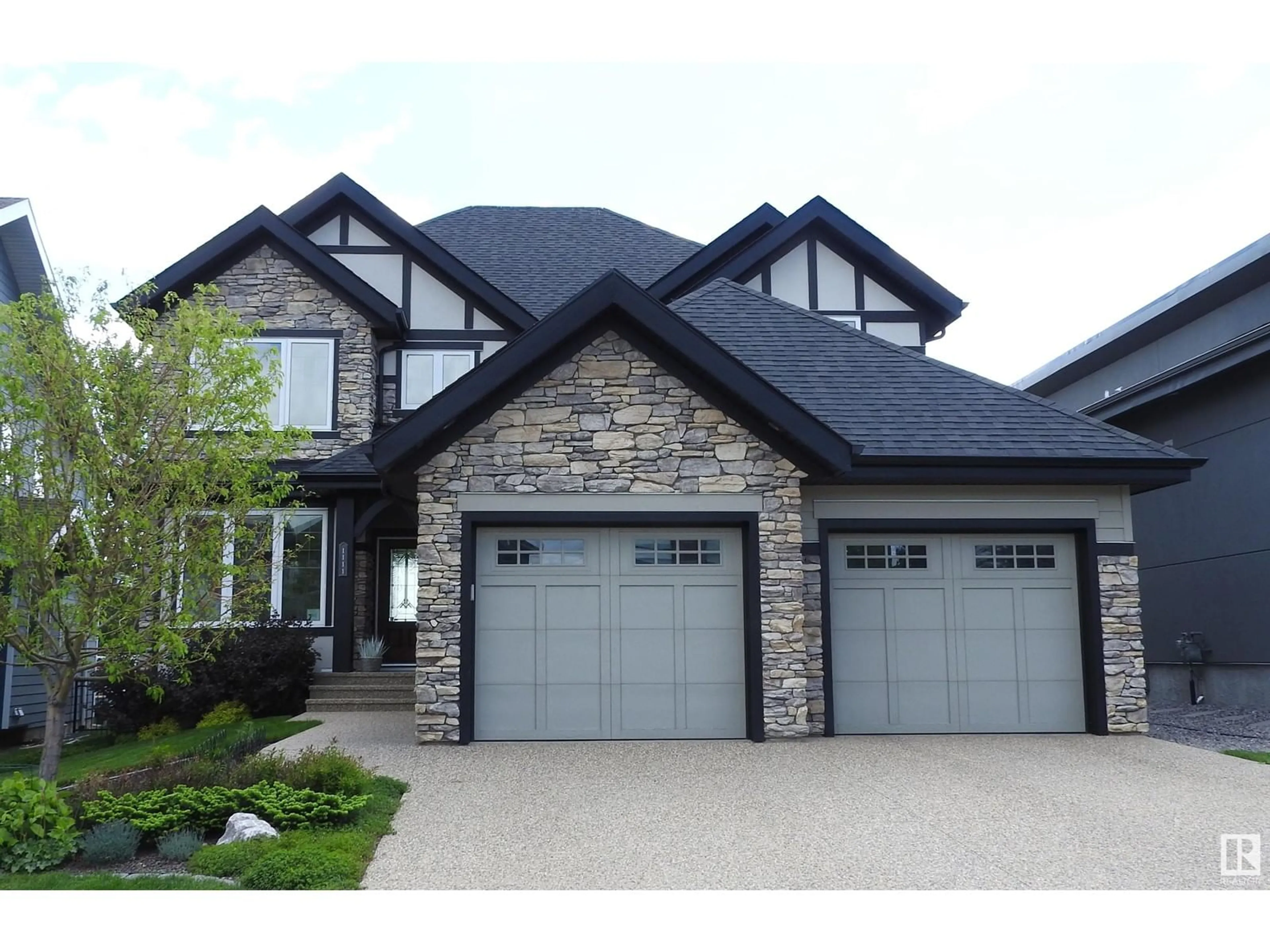 Home with vinyl exterior material, street for 1111 HAINSTOCK GREEN SW, Edmonton Alberta T6W2T8