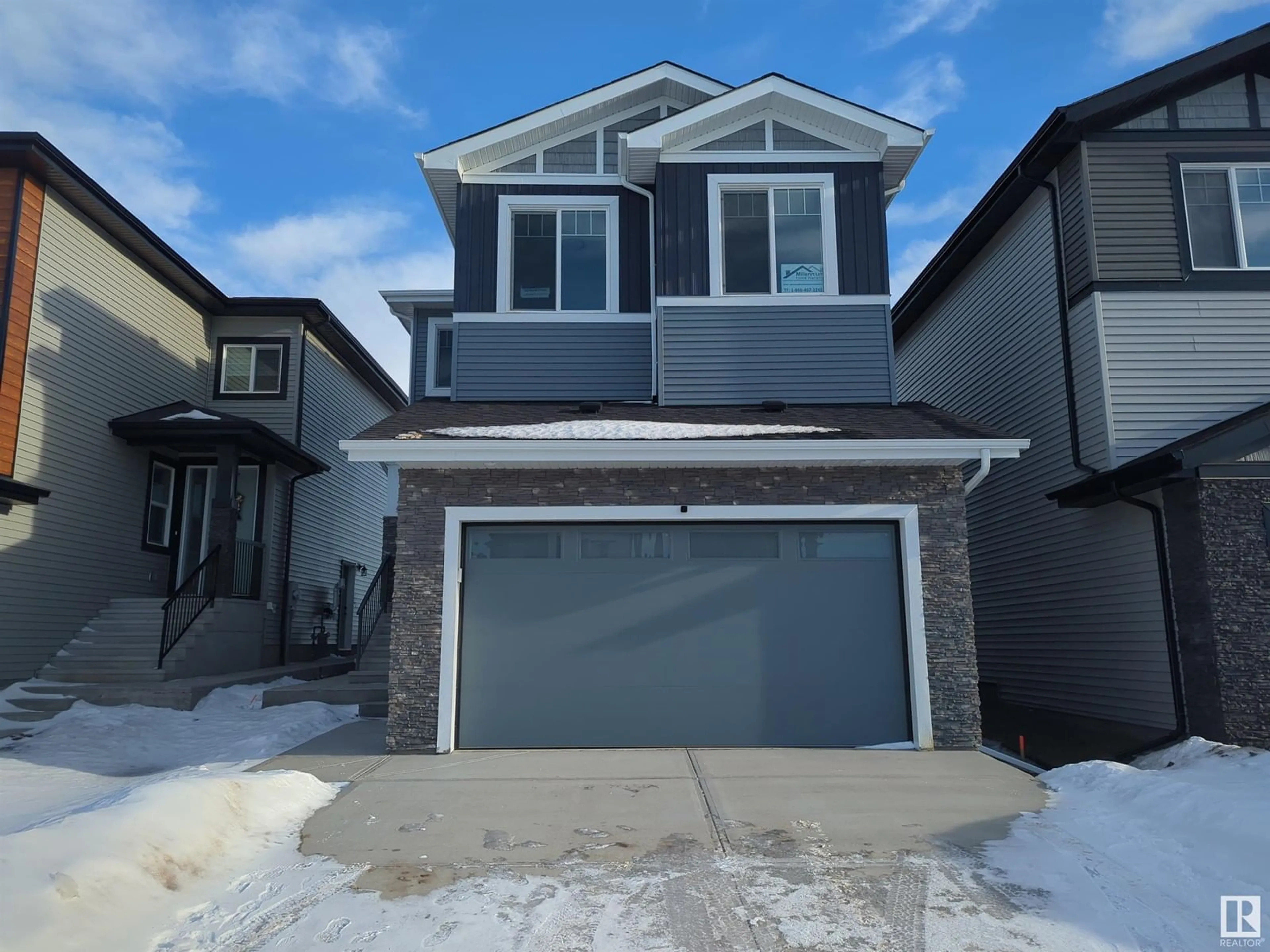 Home with vinyl exterior material, street for 125 WYATT RG, Fort Saskatchewan Alberta T8L0Z8