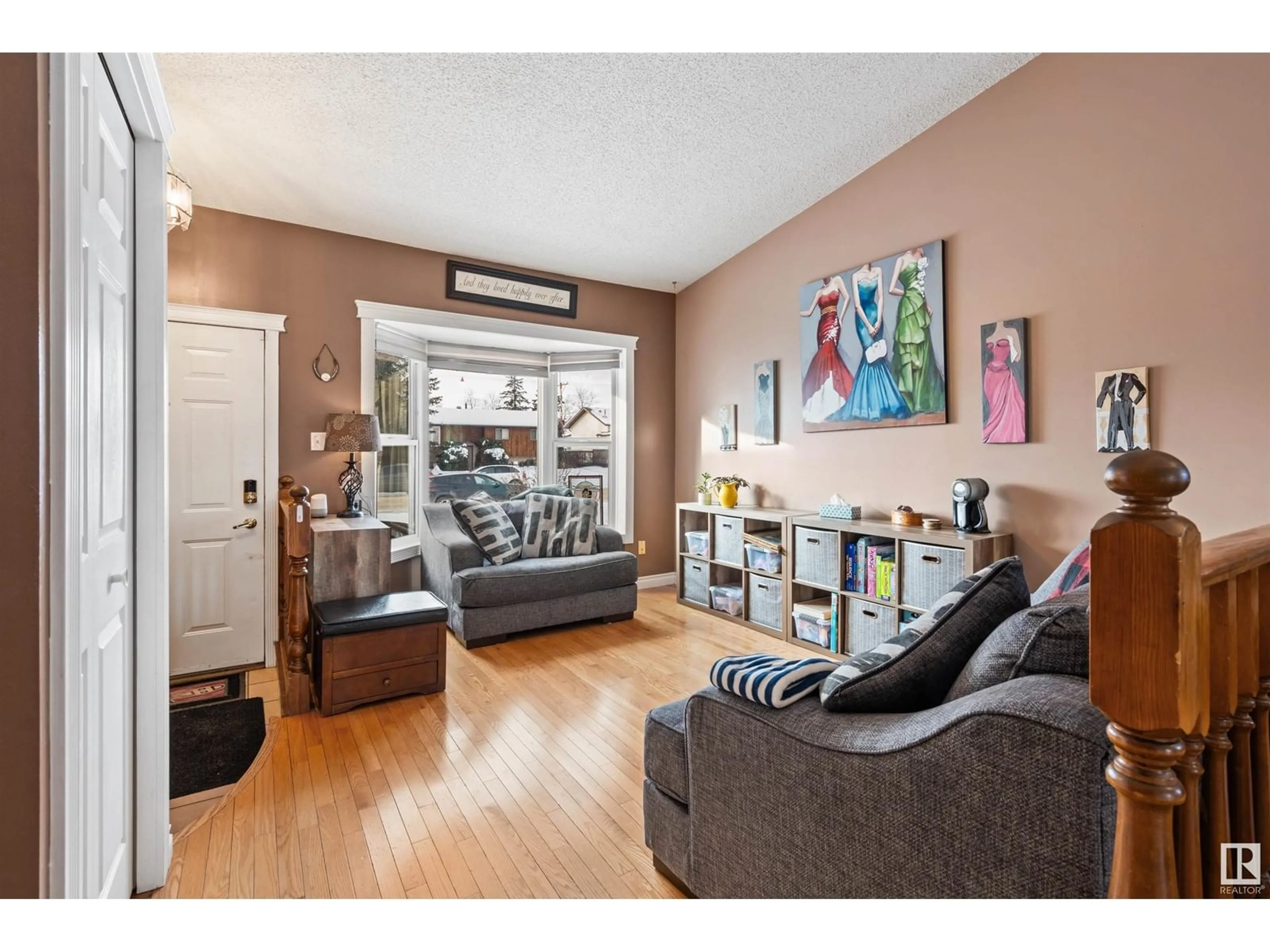 Living room with furniture, wood/laminate floor for 306 22 ST, Cold Lake Alberta T9M1E8