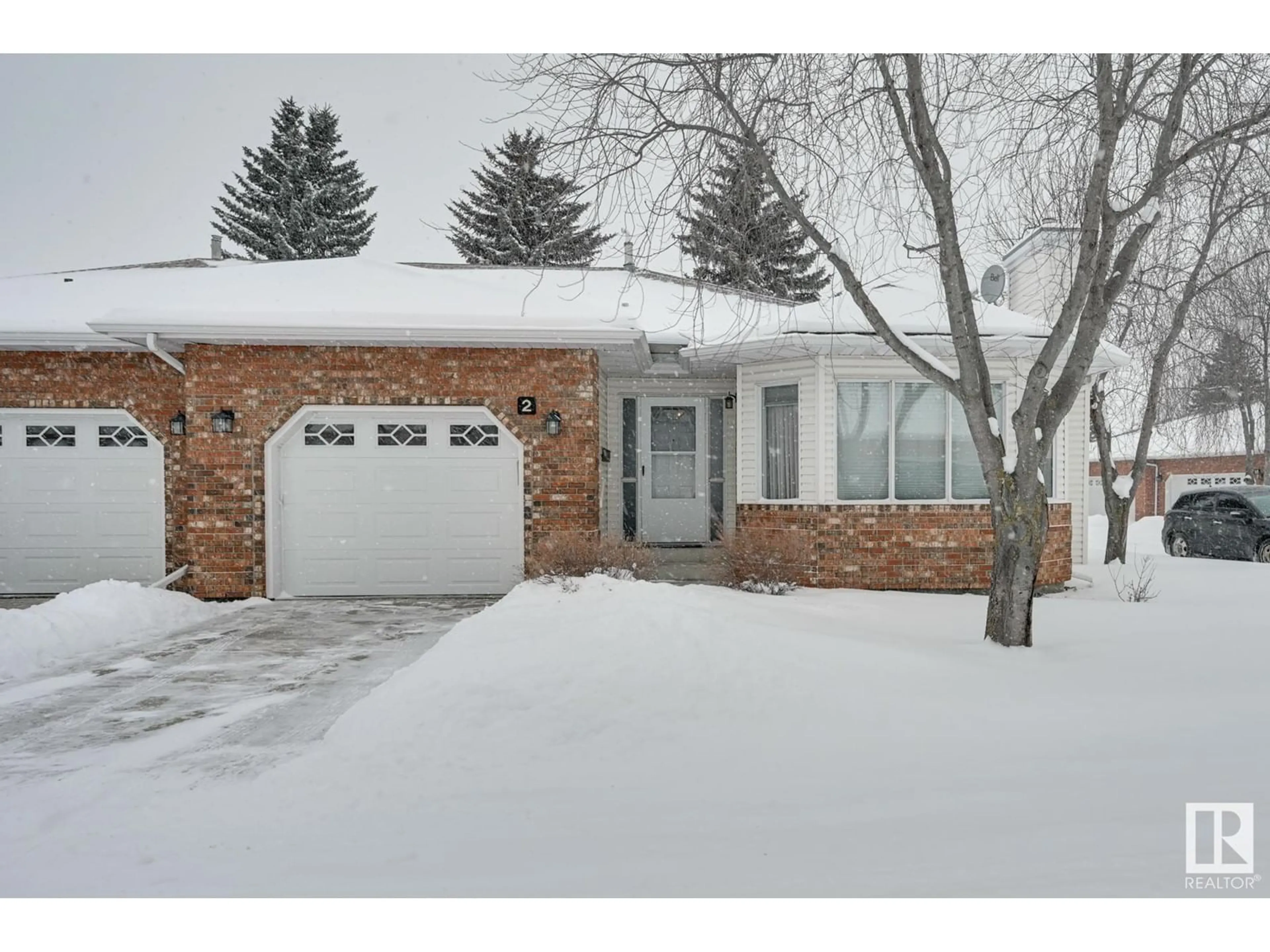 Home with brick exterior material, street for #2 320 JIM COMMON DR, Sherwood Park Alberta T8H1S6