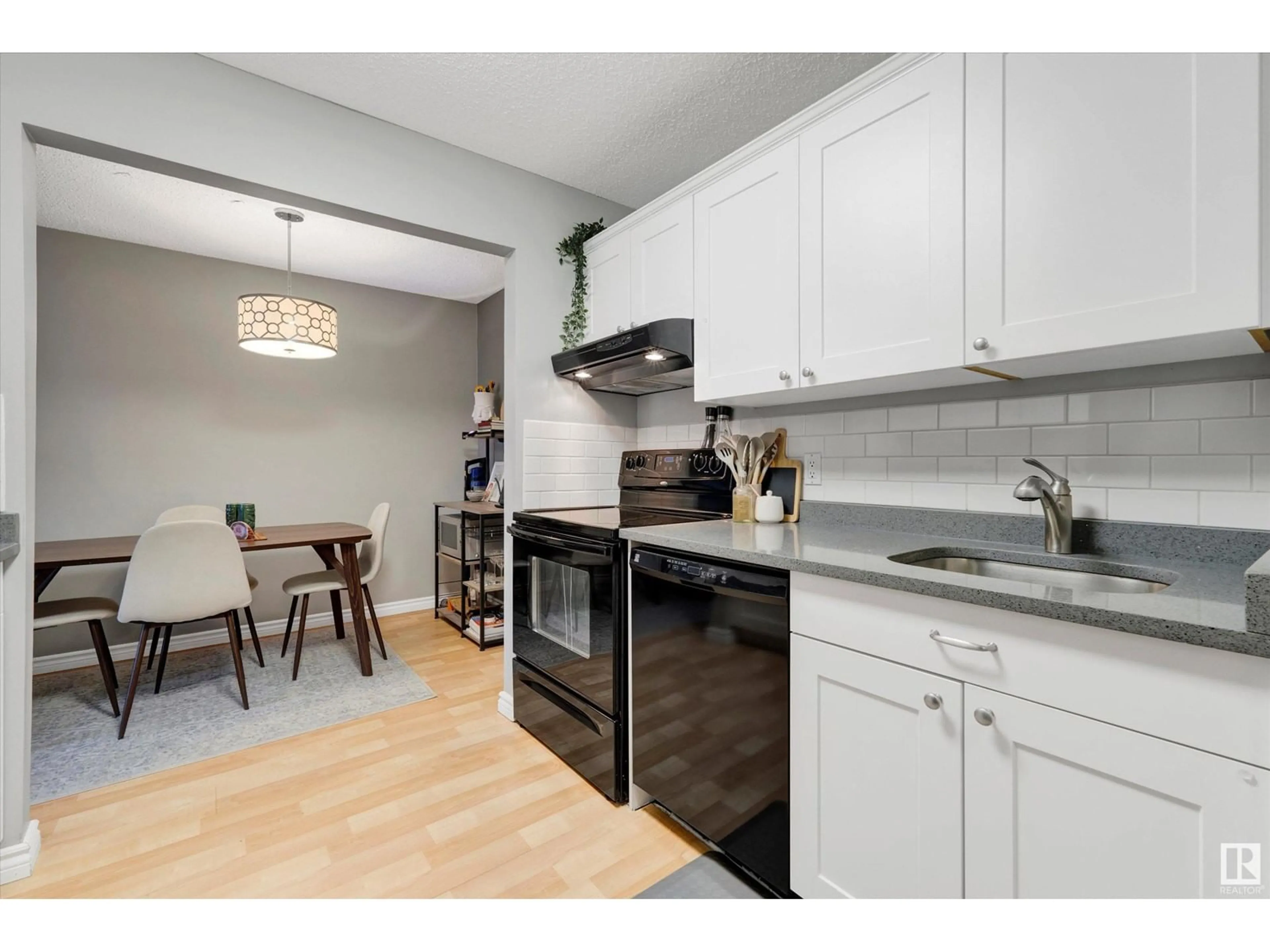 Open concept kitchen, unknown for #111 10148 118 ST NW, Edmonton Alberta T5K1Y4