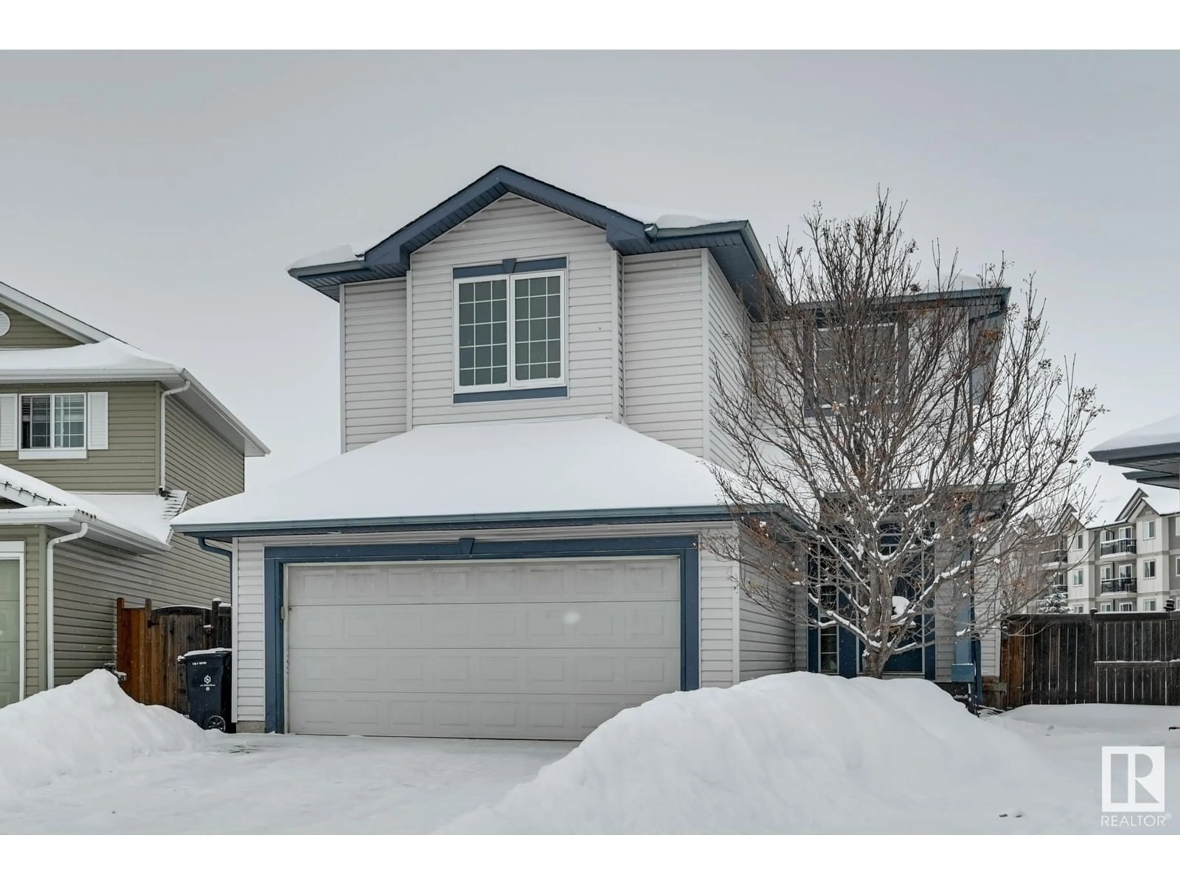 Home with vinyl exterior material, street for 21 ROCKLEY PL, Fort Saskatchewan Alberta T8L0E7