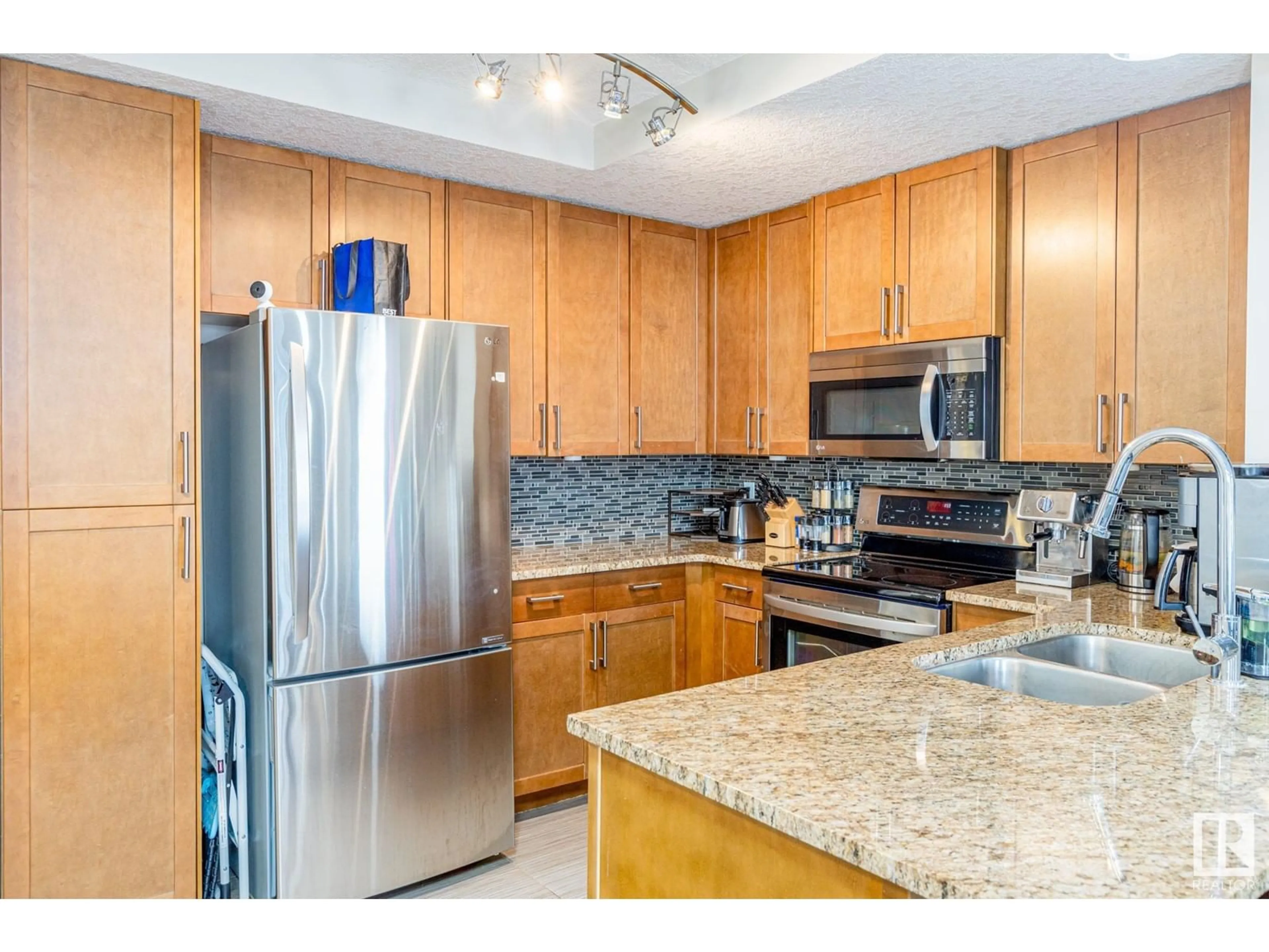 Standard kitchen, ceramic/tile floor for #1023 5151 WINDERMERE BV SW, Edmonton Alberta T6W2K4