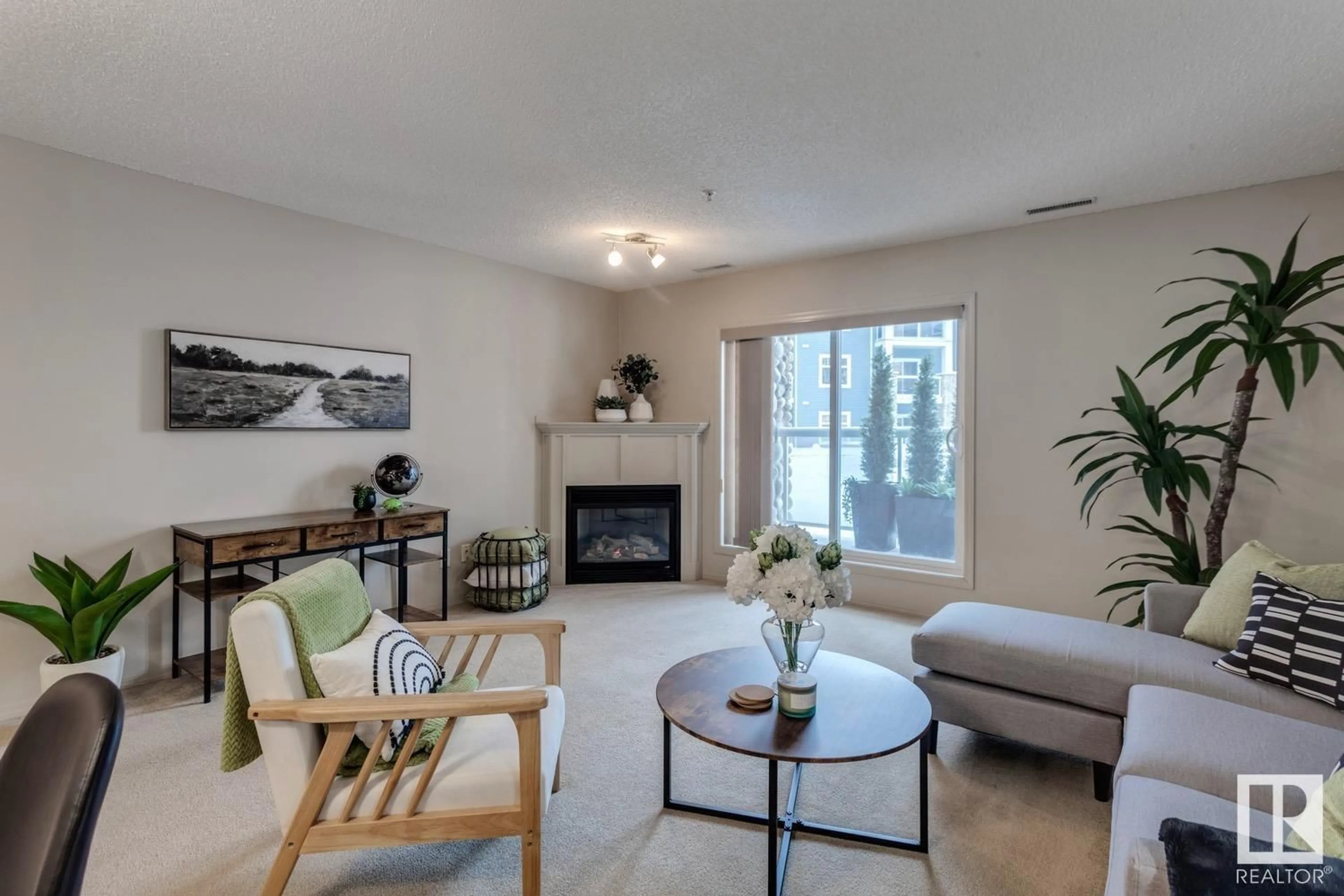 Living room with furniture, unknown for #110 16035 132 ST NW, Edmonton Alberta T6V0B4