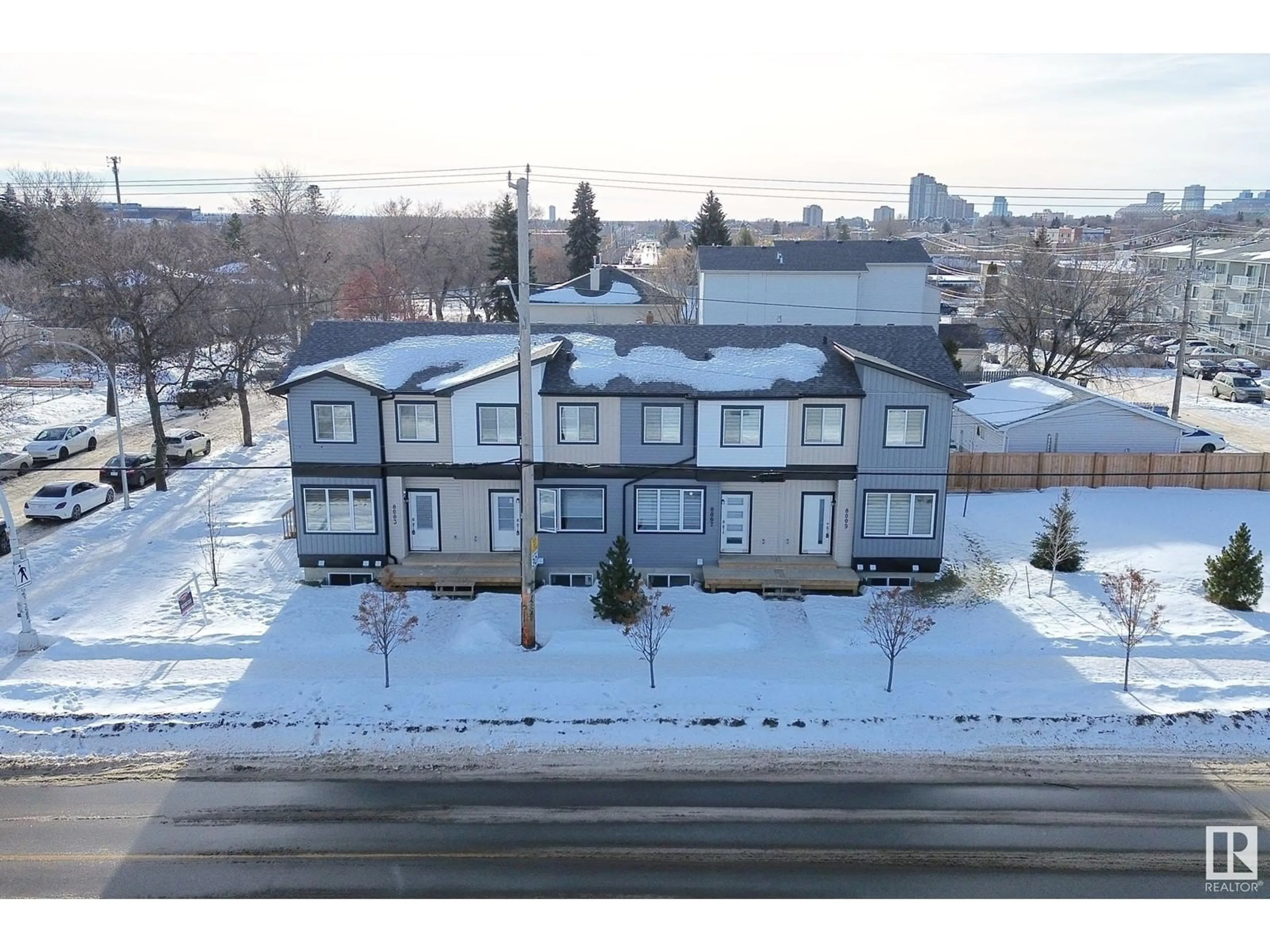A pic from outside/outdoor area/front of a property/back of a property/a pic from drone, unknown for 5,7,9 - 8003 120 AV NW, Edmonton Alberta T5B2N7