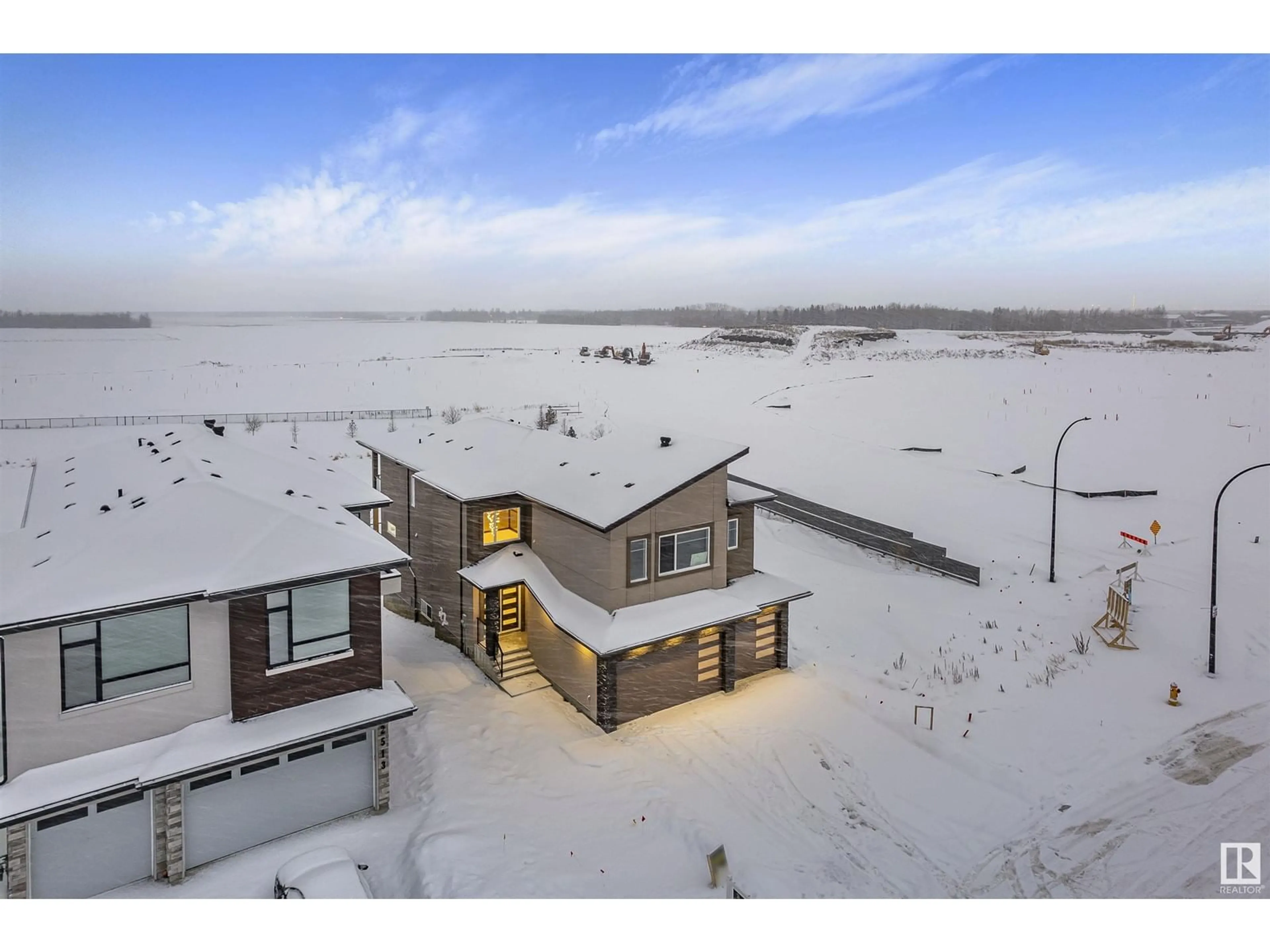 A pic from outside/outdoor area/front of a property/back of a property/a pic from drone, water/lake/river/ocean view for #2507 63 AVE NE, Rural Leduc County Alberta T4X3A4