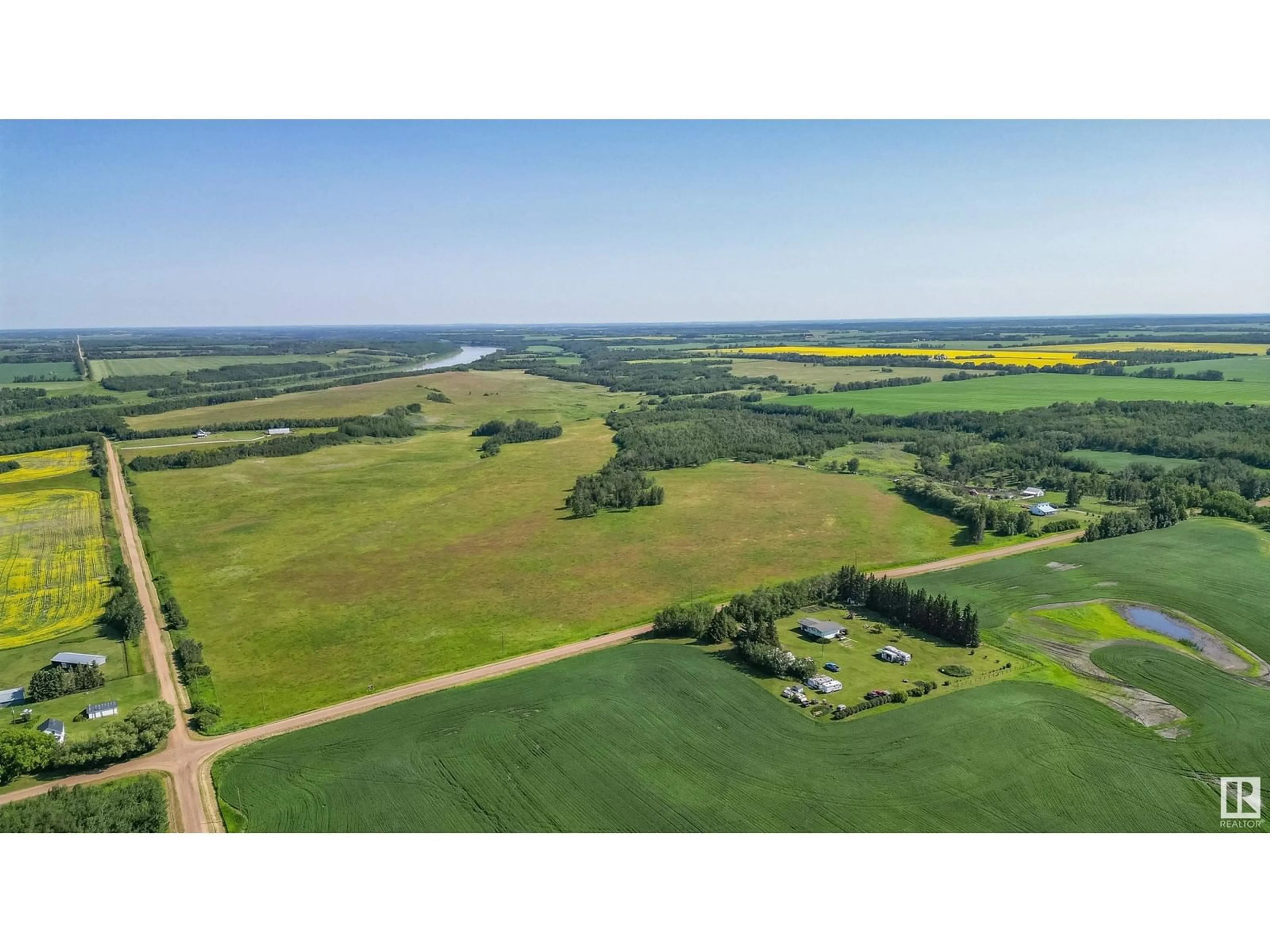 A pic from outside/outdoor area/front of a property/back of a property/a pic from drone, water/lake/river/ocean view for 201058 TWP RD 572, Rural Lamont County Alberta T0N0S0